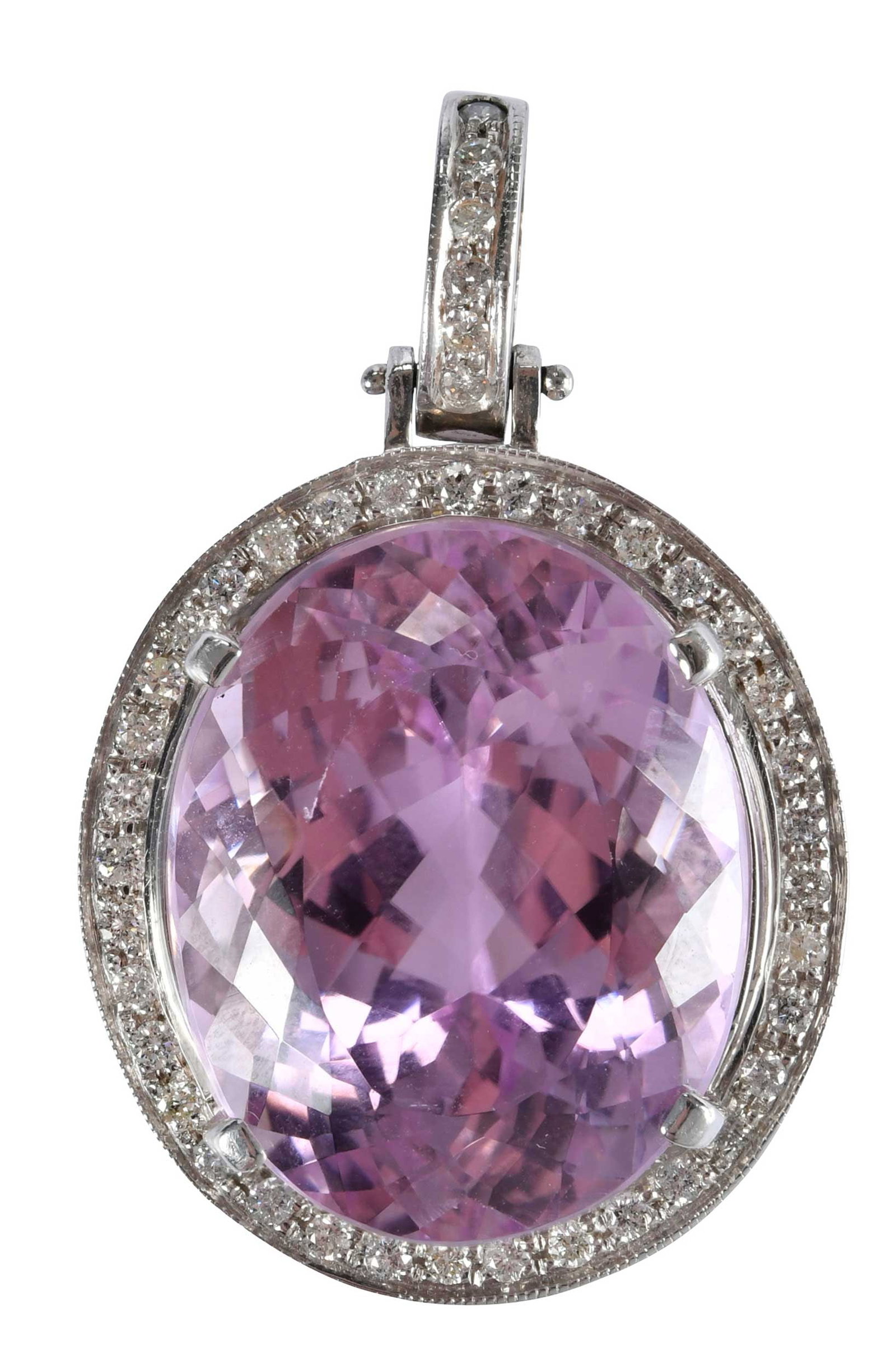 14kt. Kunzite with Diamond Halo Pendant: oval Portuguese cut kunzite, approx. 25.35ct., round faceted diamonds, approx. 0.50ctw., tests 14kt. white gold, 1-5/8 x 1 in. overall design, 25.0 g Provenance: Private Collection, Virginia Beach Not