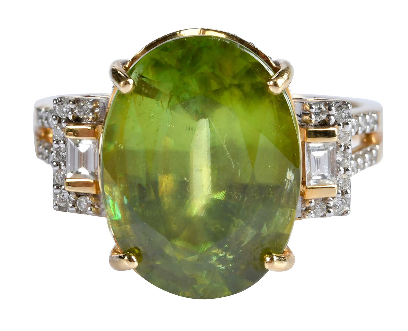 18kt. Oval Sphene and Diamond Ring: oval mixed cut sphene, approx. 13.50ct., 27 round faceted diamonds, two straight baguette cut diamonds, approx. 0.45ctw., marked "18K, 7G", yellow gold, 9-1/4 ring sz., 9.7 g Provenance: Private Colle