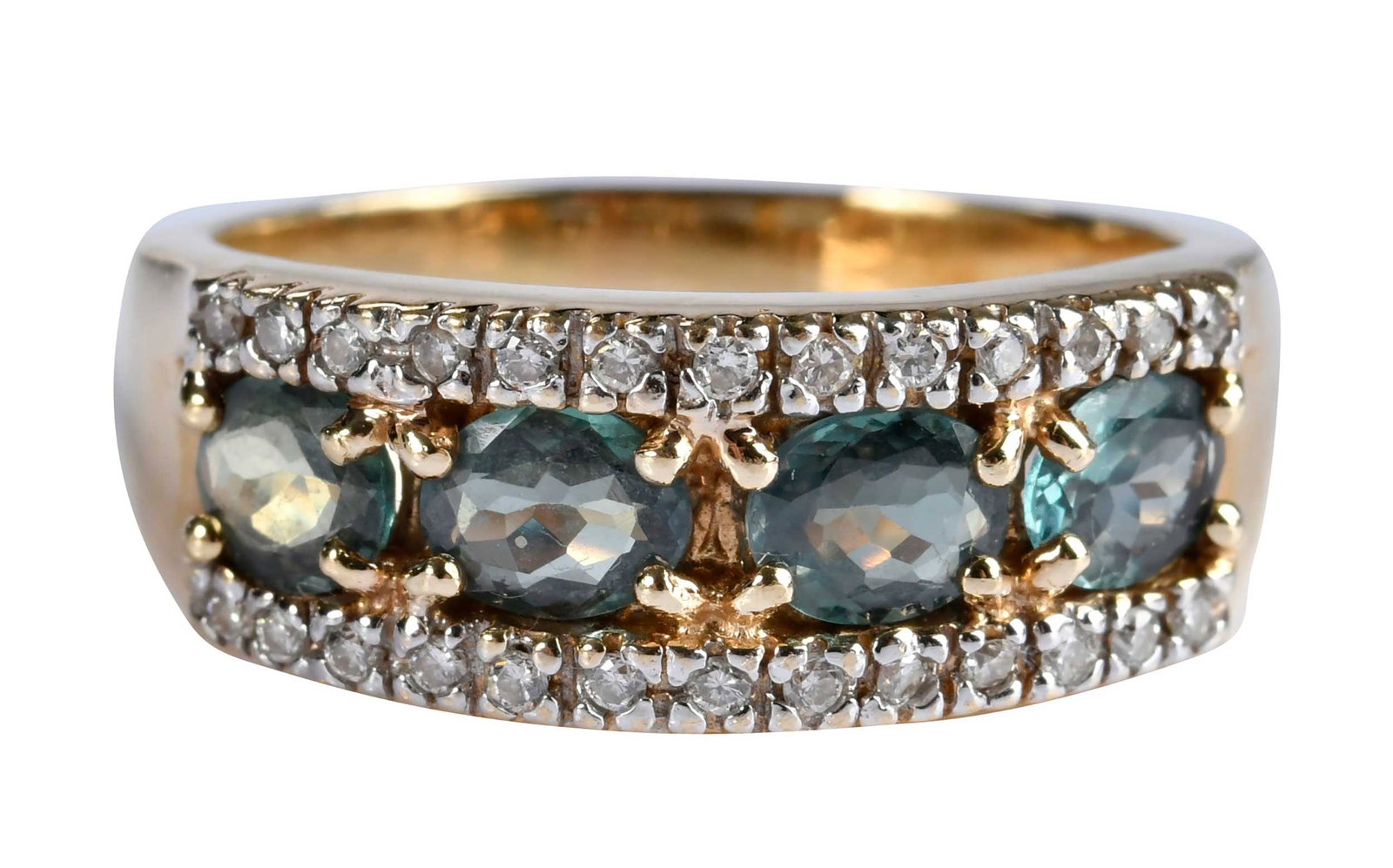 14kt. Alexandrite and Diamond Band: four oval faceted alexandrites, approx. 1.60ctw., 26 round faceted diamonds, marked "14K", yellow gold, 8-3/4 ring sz., 8.0mm at widest area, 6.1 g Provenance: Private Collection, Virginia Beach Note: