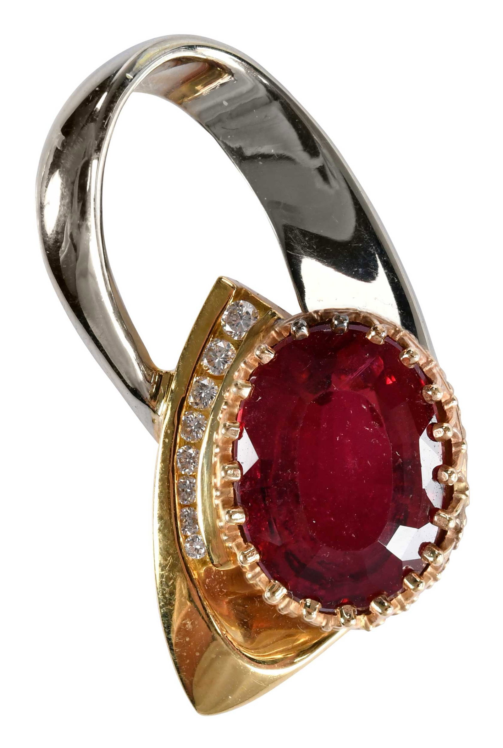 18kt. Two Tone Rubellite and Diamond Pendant: oval mix cut rubellite, approx. 8.15ct., eight round faceted diamonds, approx. 0.15ctw., marked "18K, H23", yellow and white gold, 1-1/4 in. length with bail, 12.6 g Provenance: Private Collection, Vi