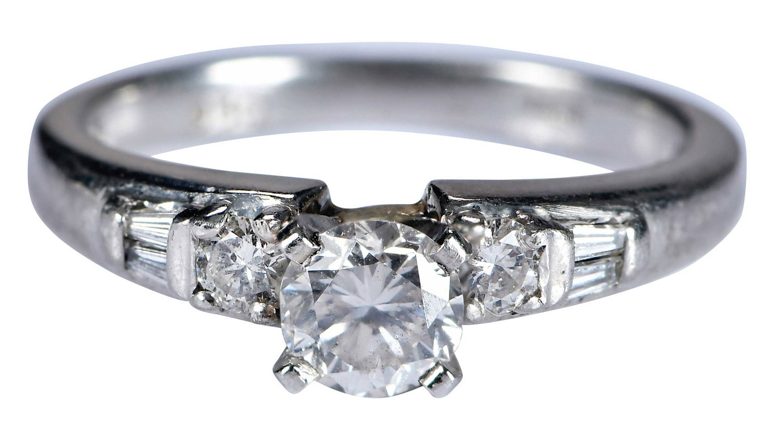 Platinum Diamond Ring with Accent Diamonds: round brilliant cut diamond, approx. 0.50ct., SI2-I1, H-J, flanked by two round brilliant cut diamonds, and four tapered baguettes, marked "PWJ, 950", platinum, 6 ring sz., 5.8 g Provenance: Estate of