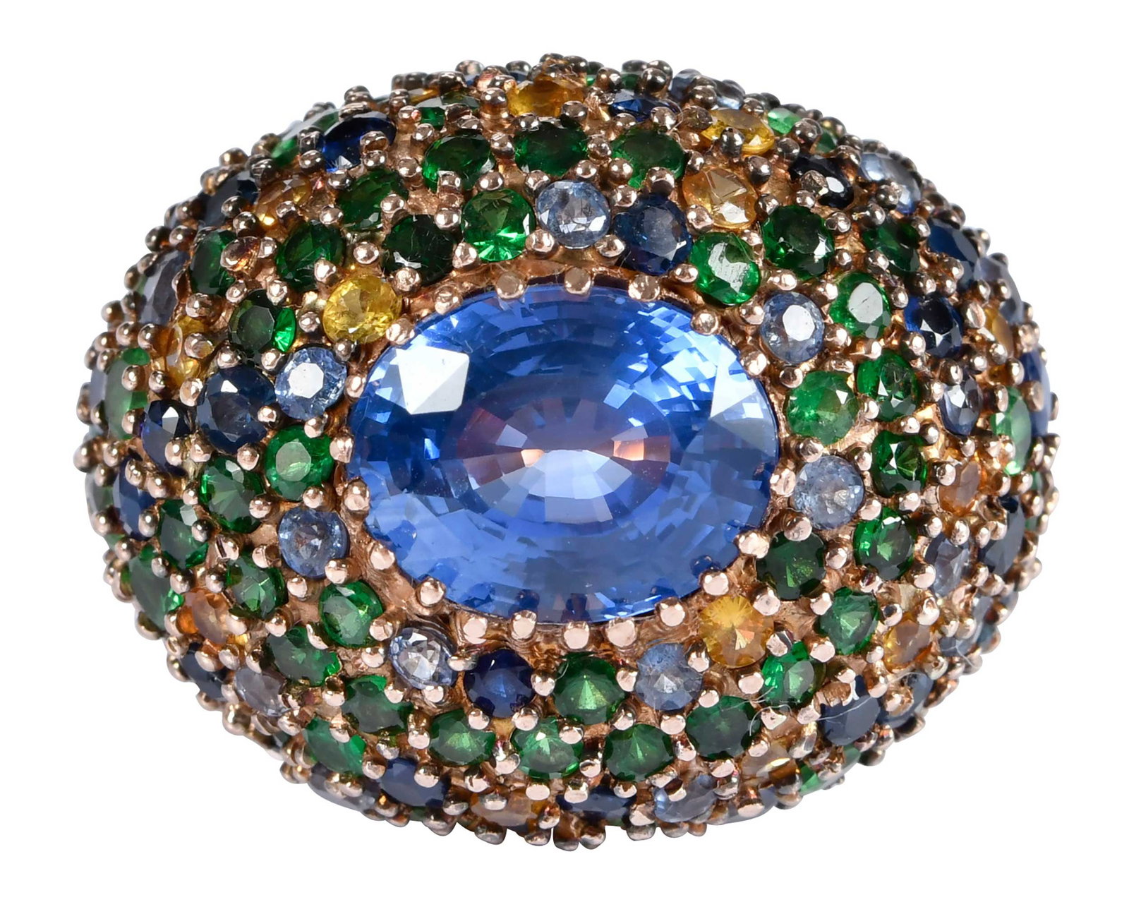 14kt. Multi Colored Sapphire and Tsavorite Bombe Ring: center oval faceted cut blue sapphire, approx. 5.00ct., surrounded by round faceted multi colored sapphires and tsavorite, marked "14K" rose gold, maker's mark, 7-3/4 ring sz., 23.0mm width of design 