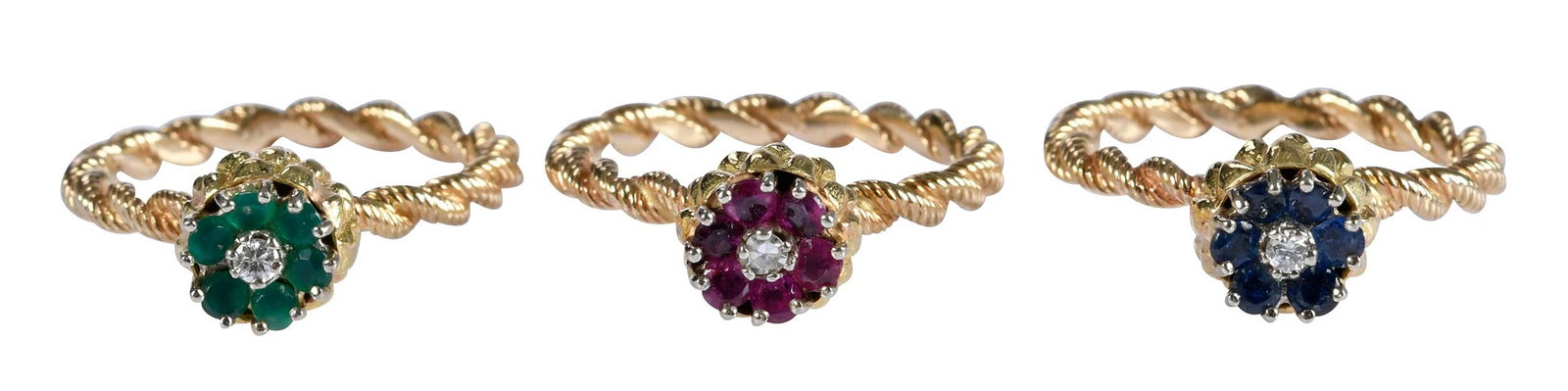 14kt. Three Flower Motif Stackable Rings, Rubies, Sapphires, Emeralds and Diamonds: flower petals of each; six round faceted gemstones, center of each; one round faceted diamond, marked "14K", yellow gold, twisted band, 9-1/2 ring sz., 16.7 g total weight Provenance: Charlottesville,