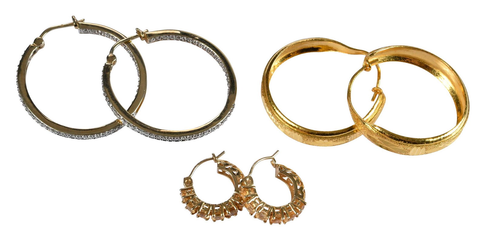 Collection of Three Pairs of Hoop Earrings: inside out diamond, marked "10Kt", yellow gold, approx. 1-1/4 in. diameter, 5.2 g; diamond cut, marked with Asian marks, tests 22kt. yellow gold, approx. 1 in. diameter, 8.2 g; round faceted citrines,