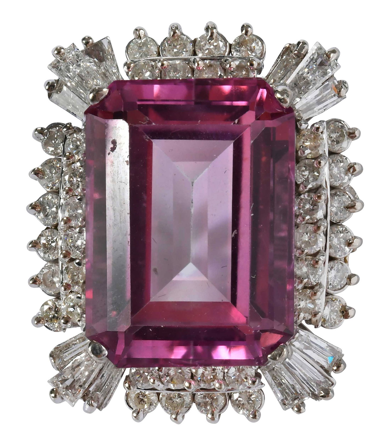 14kt. Pink Tourmaline and Diamond Omega Slide Pendant: emerald cut pink tourmaline, approx. 16.10ct., 40 round faceted diamonds, 12 tapered baguette cut diamonds, tests 14kt. white gold, 1 x 3/4 in. overall design, 12.4 g Provenance: Private Collection, V