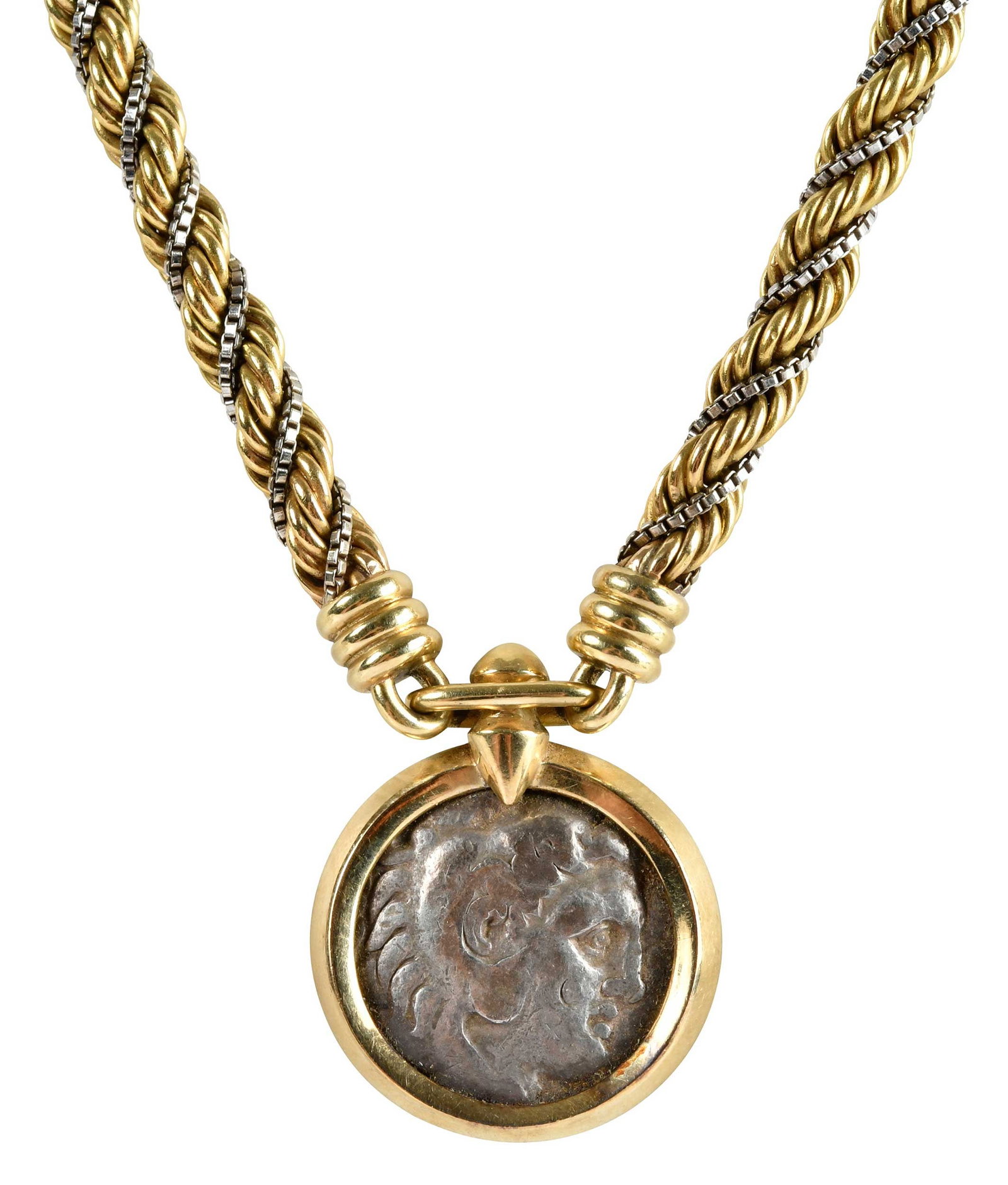 18kt. Necklace With Greek Coin: 20th century, yellow gold rope chain with intertwined white gold box chain, bar clasp, bezel set silver Tetradrachm style coin depicting Herakles with features of Alexander the Great on the obverse an