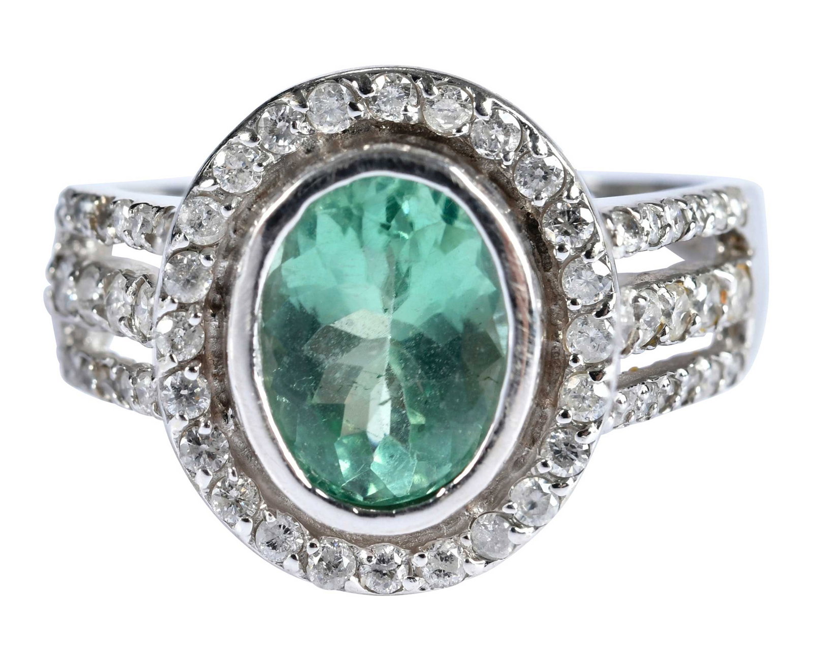 14kt. Paraiba Type Tourmaline and Diamond Halo Ring: oval Portuguese cut Paraiba type tourmaline, bezel set, approx. 1.85ct., 62 round faceted diamonds, approx. 0.75ctw., marked "14k", white gold, 8-1/4 ring sz., 6.3 g Provenance: Private Collection, Vi