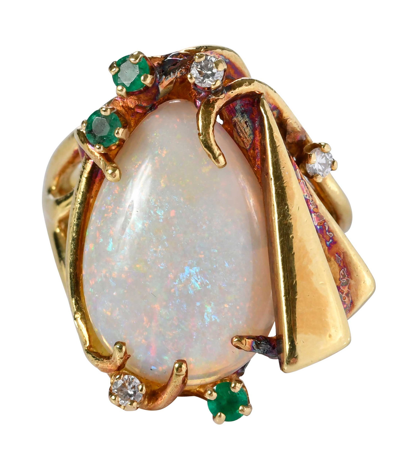 18kt. St. Geo Modern Style Opal and Gemstone Ring: pear shape cabochon white opal, three round faceted emeralds, approx. 0.15ctw., three round faceted diamonds, approx. 0.10ctw., marked "ST.GEO, 18K", yellow gold, 7-1/2 ring sz., 18.2 g Provenance: Pr