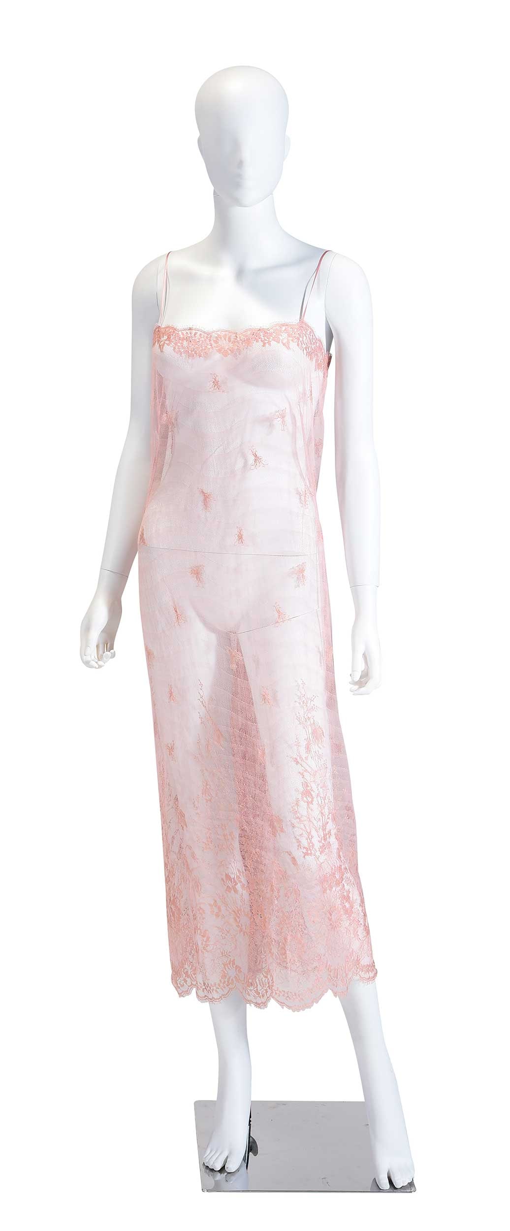 Elspeth Gibson Pink Lace Slip Dress, Cher Provenance: London, tagged size "14", length 43 in., width 15in. Provenance: Cher; Star Wares Collectables, Agoura Hills, California, July 2001 (accompanied by copy of receipt for $188.50); Private Collection Not