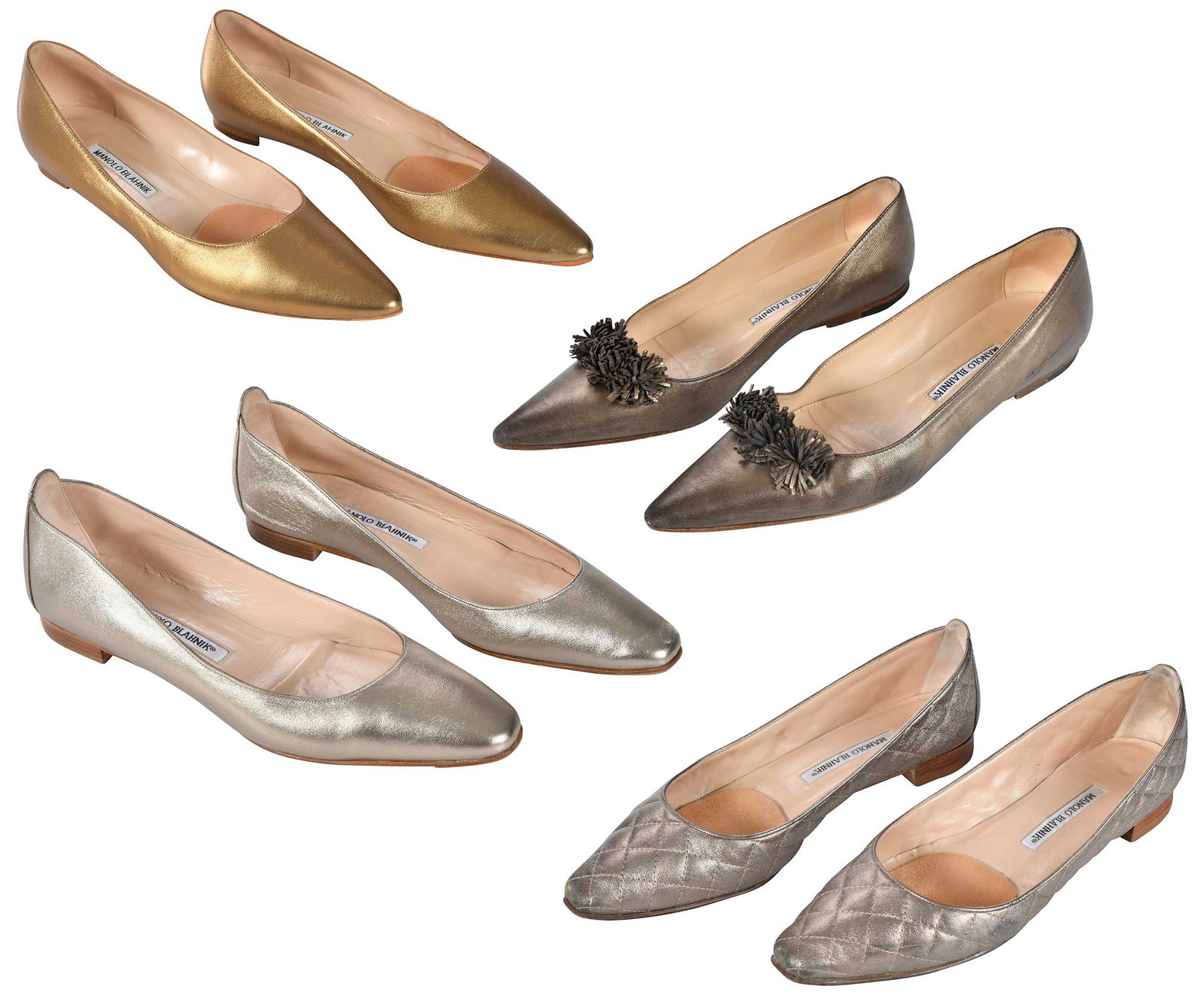 Four Pairs of Manolo Blahnik Metallic Ladies' Flats: Spain/Italy, all marked size "39-1/2" (US size 8-1/2 or 9); in original boxes Provenance: Private Collection, Highlands, North Carolina