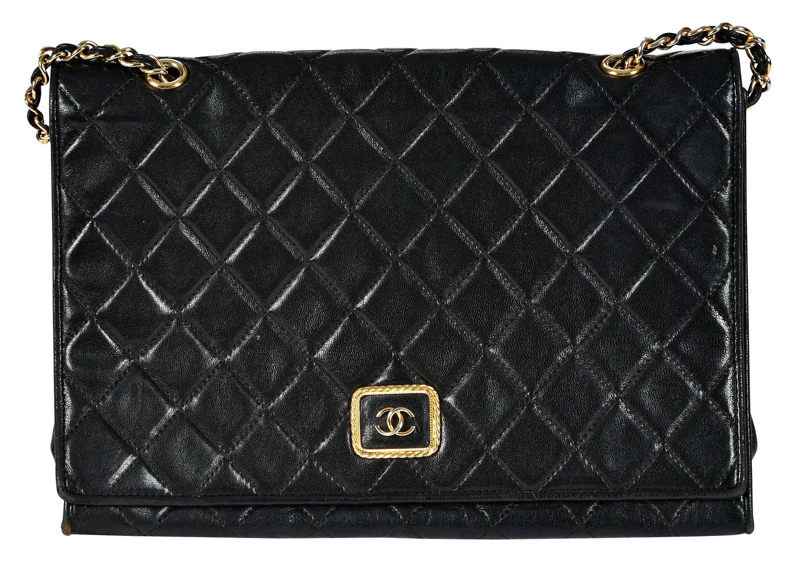 Vintage Chanel CC Flap Shoulder Bag: France, pre 1986, black leather and 24kt gold plated hardware, chain link strap, 8 x 11 x 1-1/2 in., strap drop 17 in. Provenance: Private Collection, Biltmore Forest, North Carolina
