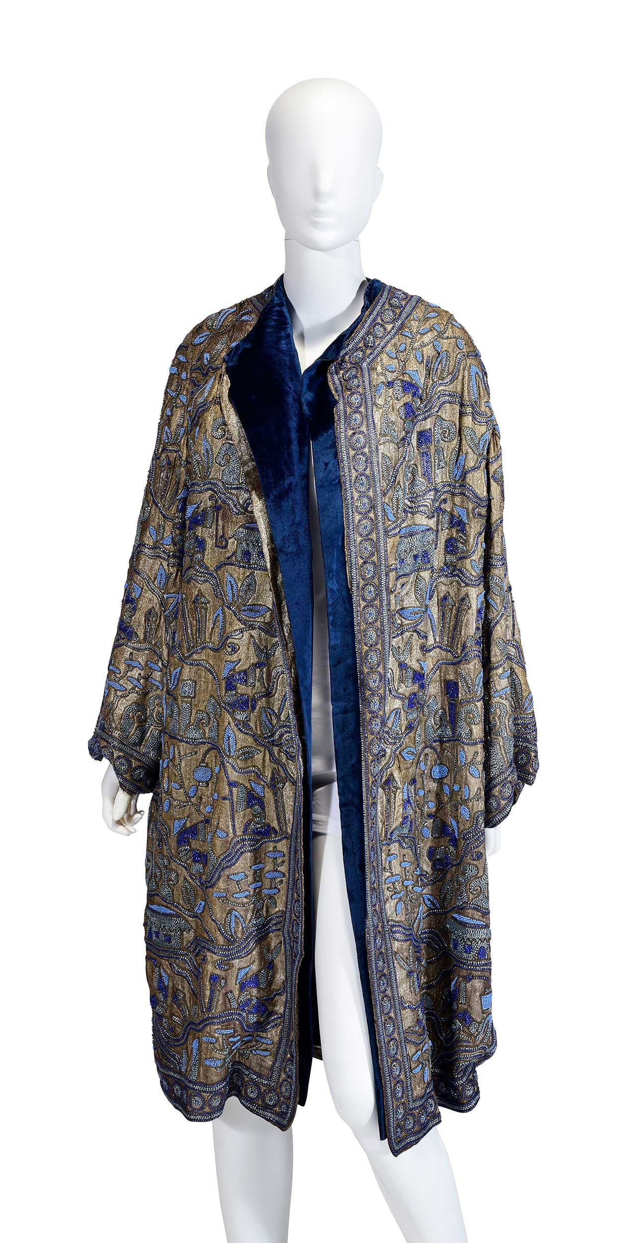 Rare and Ornate Premet Couture Beaded and Velvet Lined Evening Coat: France, late 1920s, untagged, silk, velvet, and metallic thread with beadwork Chinoiserie scenes, shoulder 14-1/2 in., length 41-1/2 in., pit to cuff 14 in. Provenance: Private Collection Note: An ide