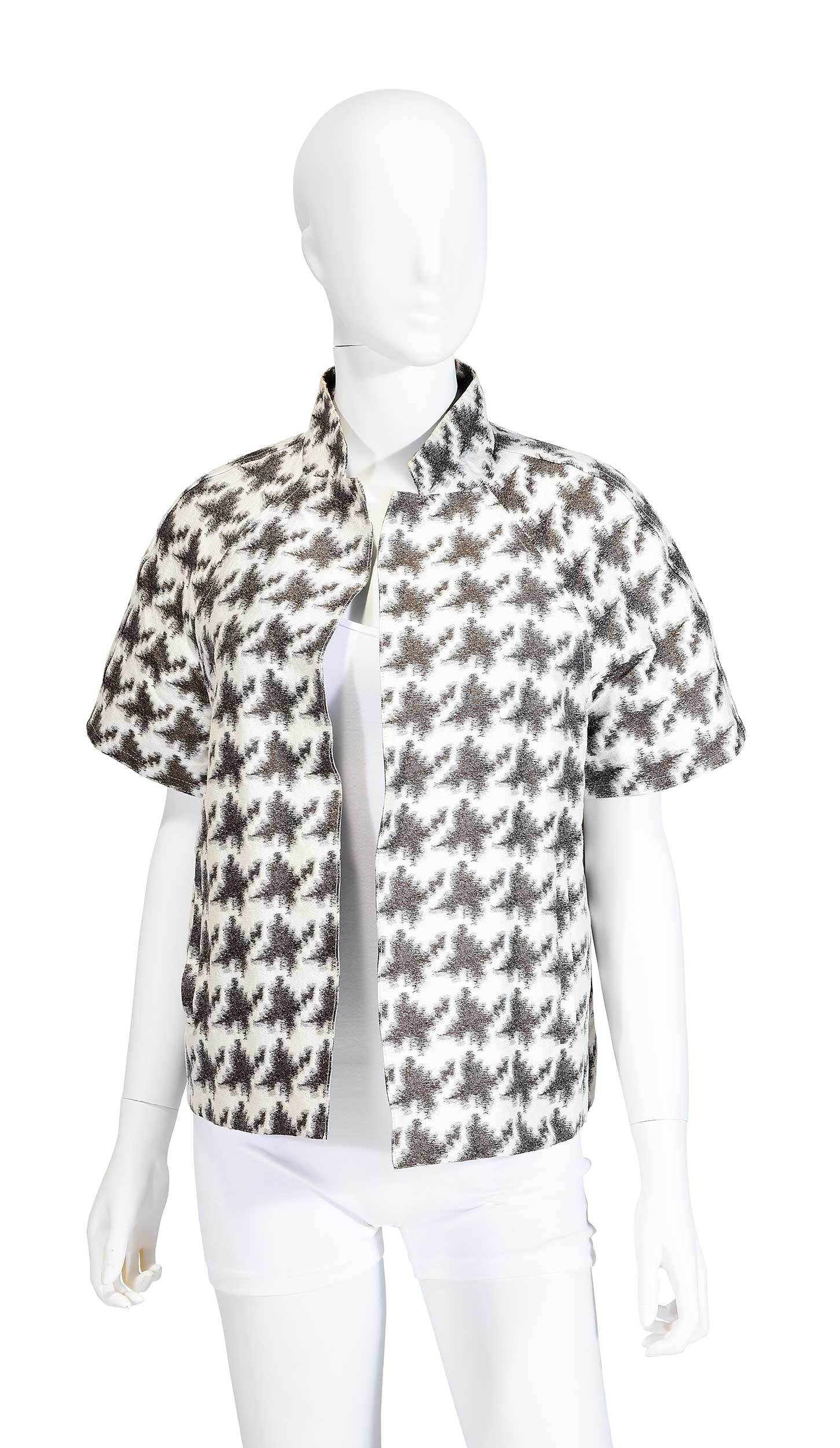 Dusan Overshirt/Jacket: Italy, tagged size "L", shoulder 16 in., length 21-1/4 in., sleeve 2 in. Provenance: Private Collection, Highlands, North Carolina