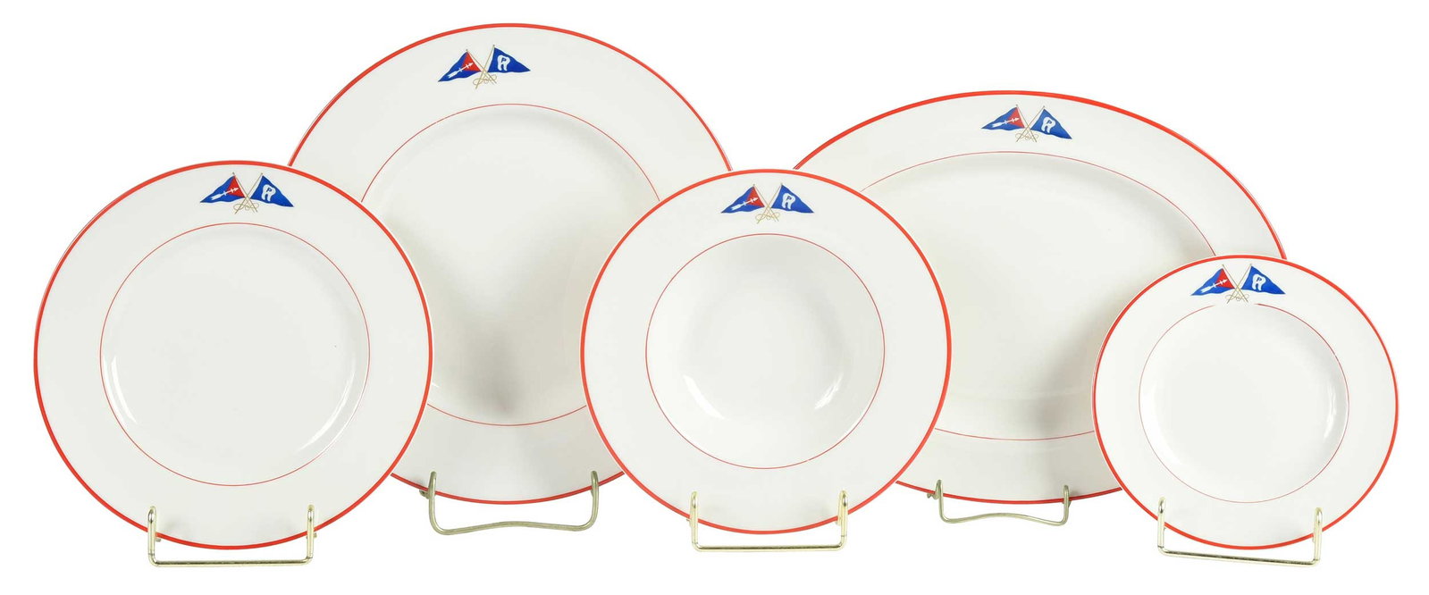 25 Pieces of Crest Studios Decorated Pickard Yacht China, Service for Six: 20th century, each decorated with crossed burgees and marked "Pickard/Decorated/by/Crest Studio" at undersides of bases, comprising: ovoid serving platter, six dinner plates, six lunch plates, six