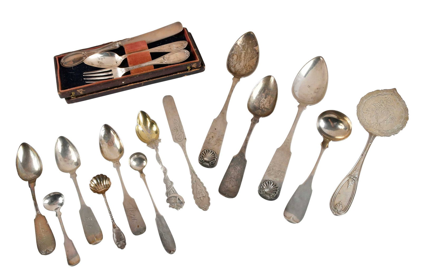 16 Pieces Coin Silver Flatware: American, mid 19th century, including Kentucky sauce ladle, marks for James Innes Lemon (Louisville, Kentucky, working 1828-1869); Daniel Low Salem spoon; three piece cased youth set; solid handle