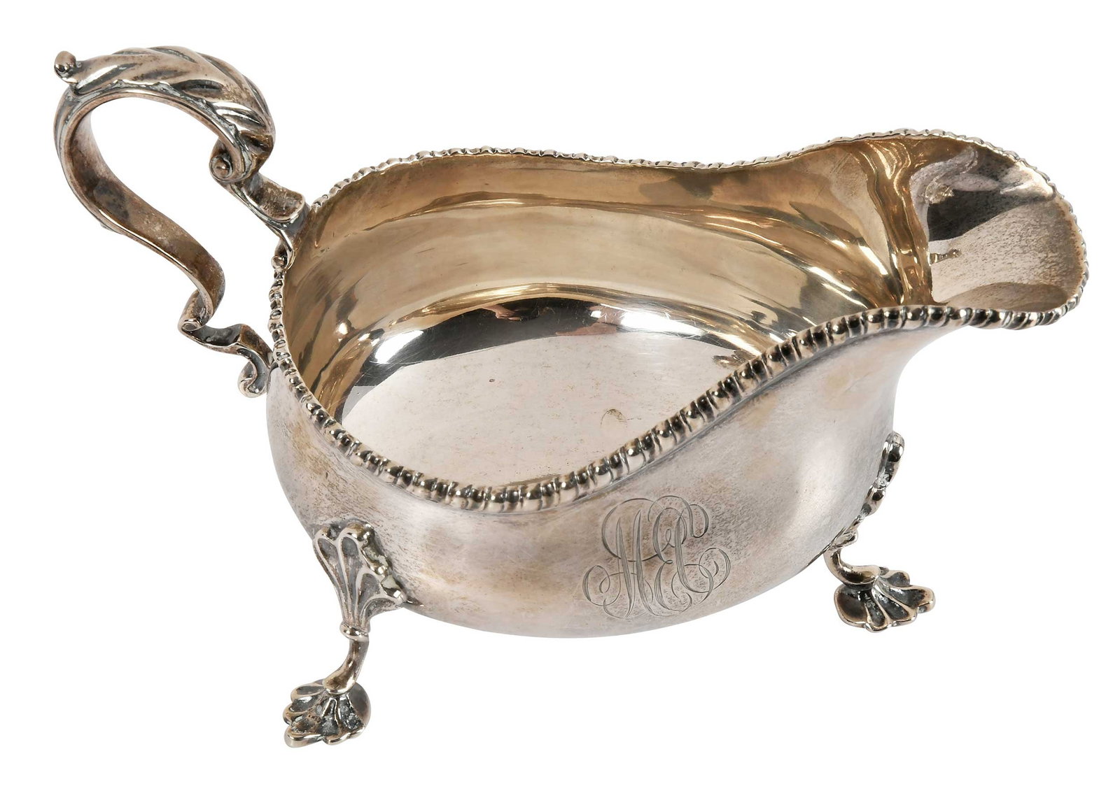 George II Style Sterling Sauce Boat: American, 20th century, oval form with gadroon border, shell feet, monogram, marks for Shreve, Crump & Low, 5.85 oz. T., 4 x 6-1/4 x 3.-3/4 in. Provenance: Private Collection, Westchester County, New