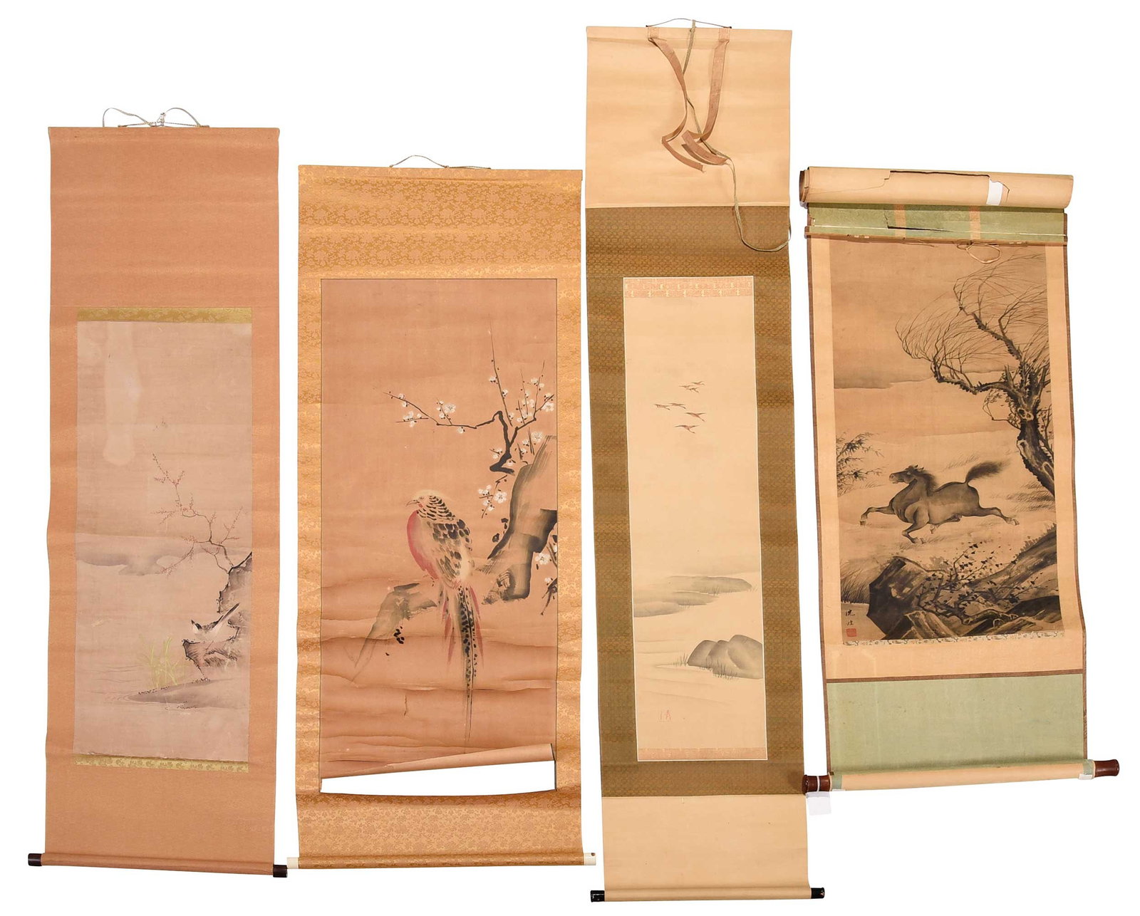 Four Hand Painted Asian Scrolls, Animals: Chinese and Japanese, 19th/20th century, horse; geese in flight; falcon, with ivory caps; sparrow; largest 45-1/2 x 23-1/4 in. Provenance: Estate of Gary L. Johnson, Virginia Note: This lot contains a