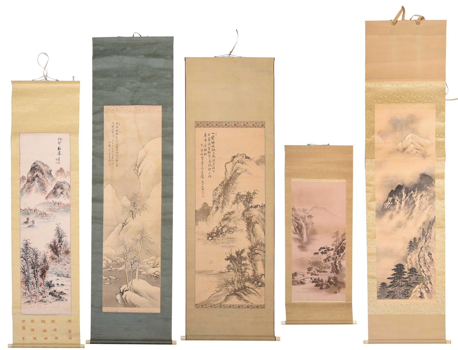 Five Asian Scrolls with Mountainous Landscapes: Chinese and Japanese, each with ivory caps, signatures, and chop seals, largest 87 x 22 in. Provenance: Estate of Gary L. Johnson, Virginia Note: This lot contains animal or plant material that may be