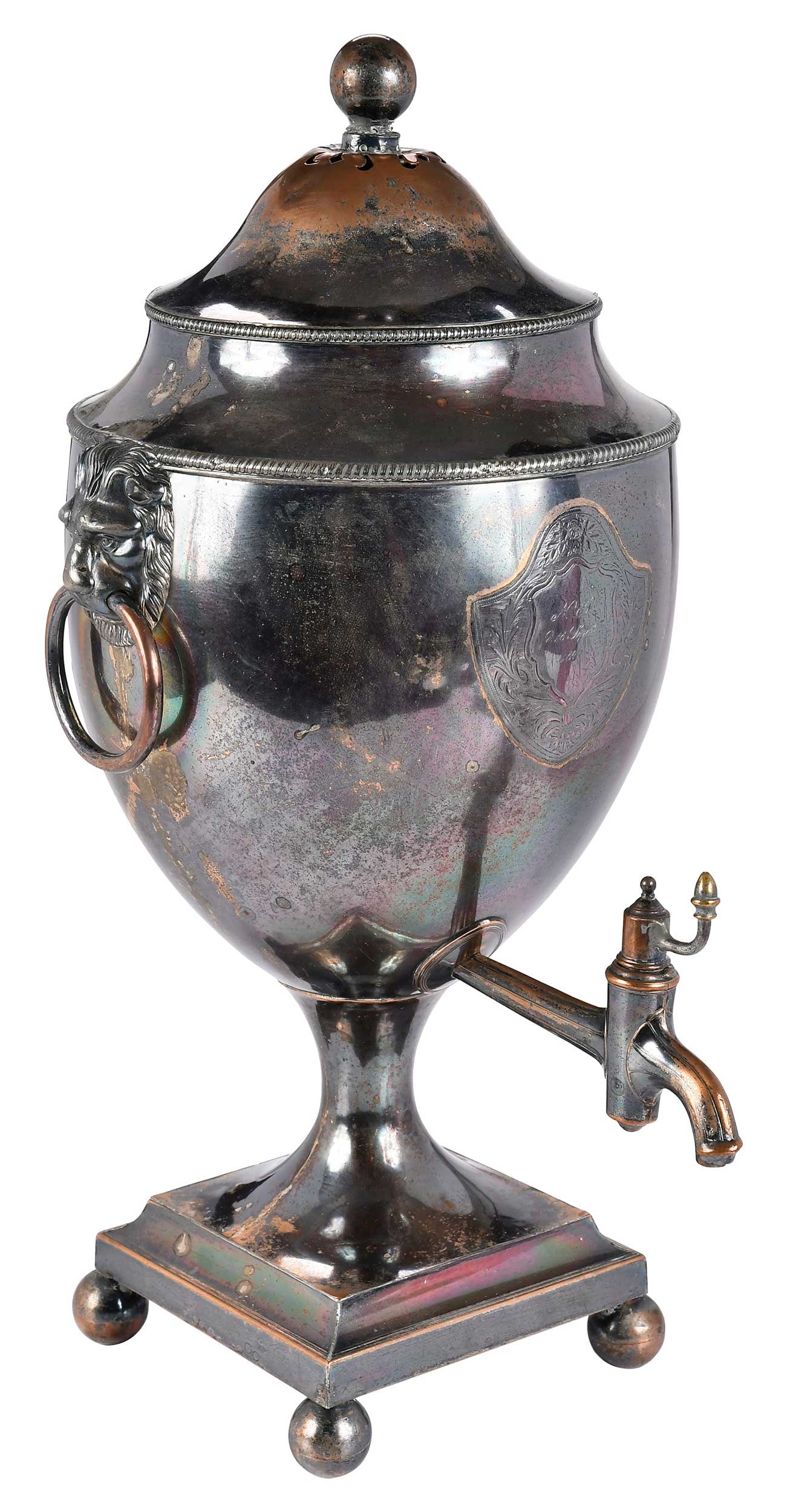 Old Sheffield Plated Hot Water Urn: English, early 19th century, urn form body with lion's head and ring handles, ball feet, engraved let in shield, 19 x 9-1/2 x 11 in. Provenance: Estate of Gary L. Johnson, Virginia