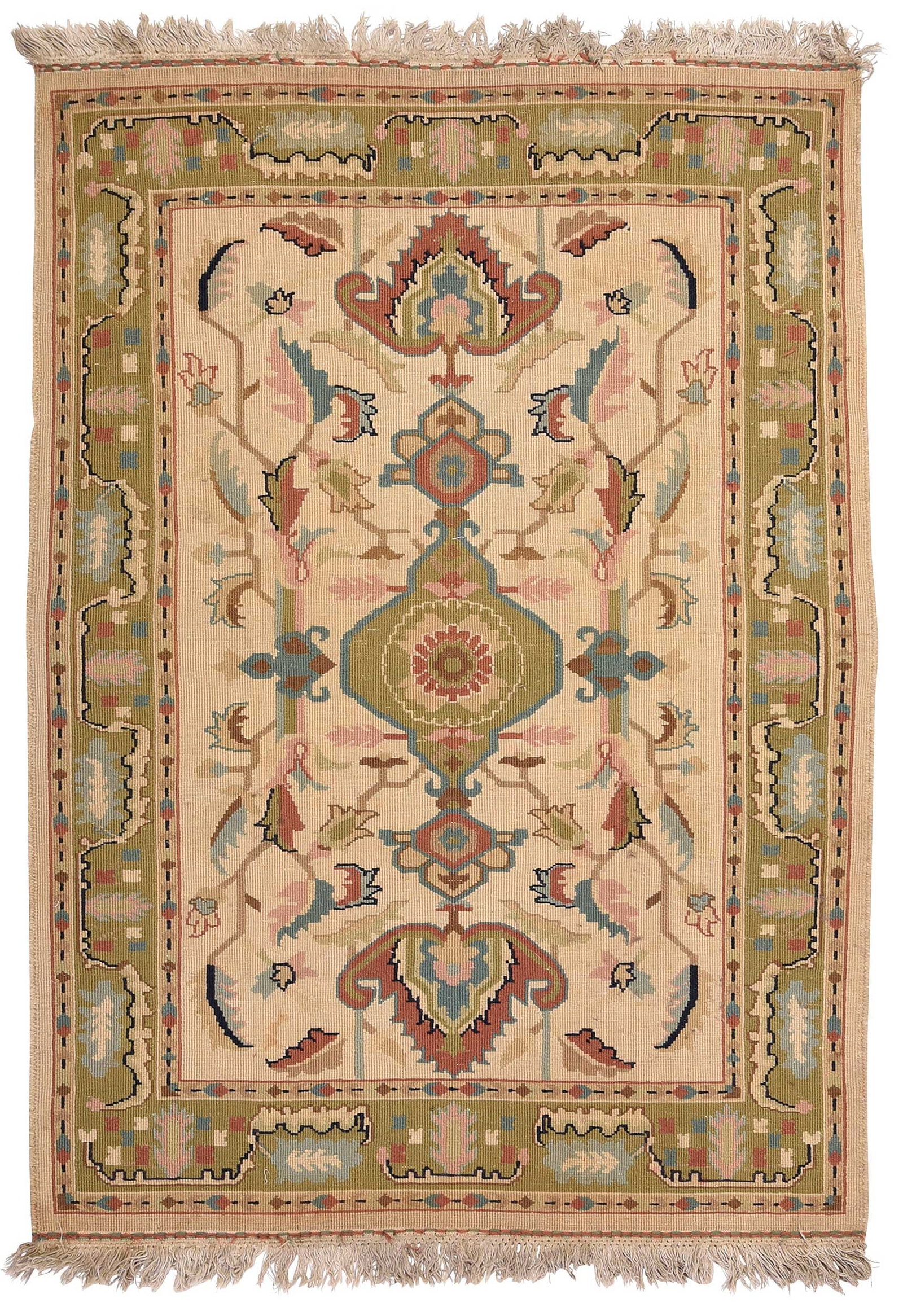 Flat Weave Woolen Rug: 20th century, tan field with floral central medallion green border with leaves and vines, 5 ft. 8 in. x 3 ft. 11 in. Provenance: Private Collection, Asheville, North Carolina