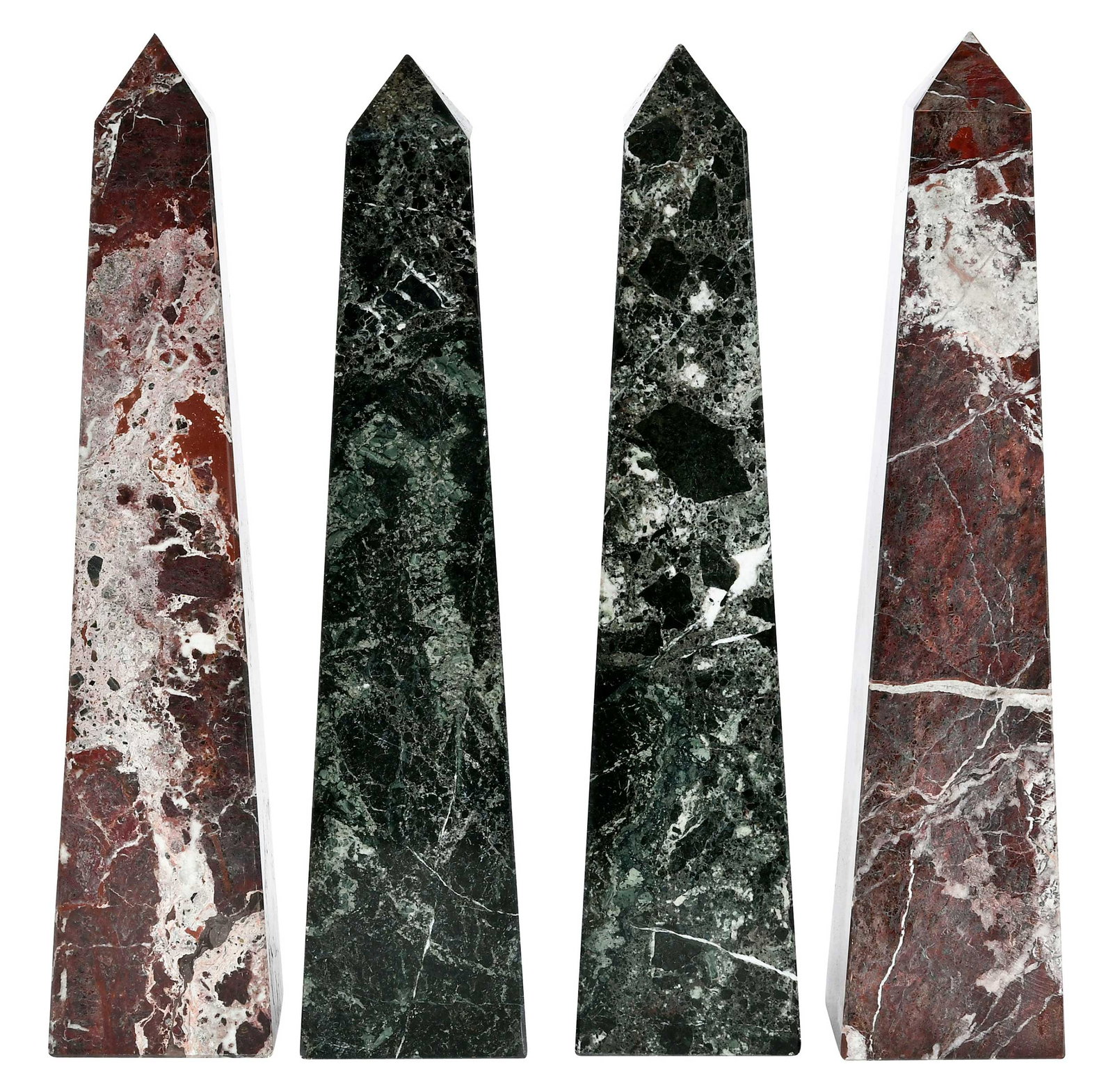 Four Marble Obelisks: two sets of near pairs, without pedestal bases, largest approx. 18-1/4 x 4-1/8 x 4-1/8 in. Provenance: Collection of Steve Stewart, Lake Lure, North Carolina
