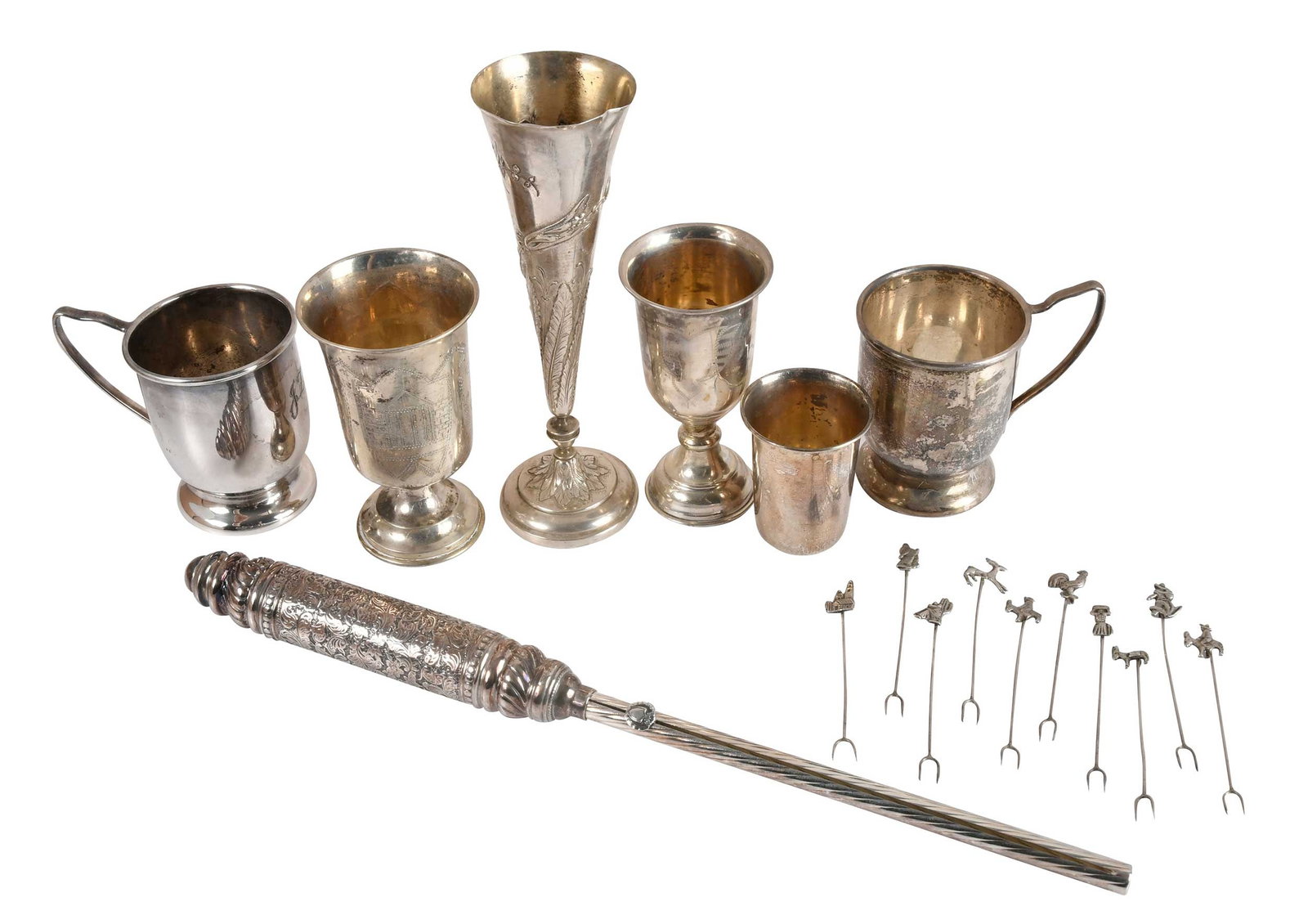 Seven Silver Table Objects: 19th/20th century, Judaica candle lighters, marked "925", 13-1/4 in.; two Kiddush goblets and one Kiddush beaker; trumpet vase, unmarked, test .900 or better, 7 in.; set of 12 Peruvian cocktail forks,