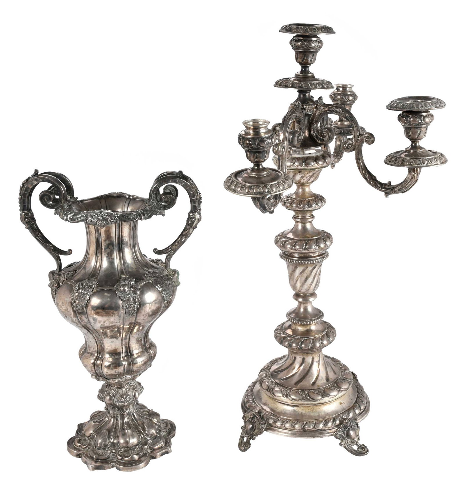 Continental Silver Candelabra and Two Handled Vase: late 19th/20th century, German five cup candelabra, partial marks on base, .835 fine, 47.06 oz. T., 22 in.; urn form two handle vase, floral and fruit decoration, cancelled mark on base, test .762