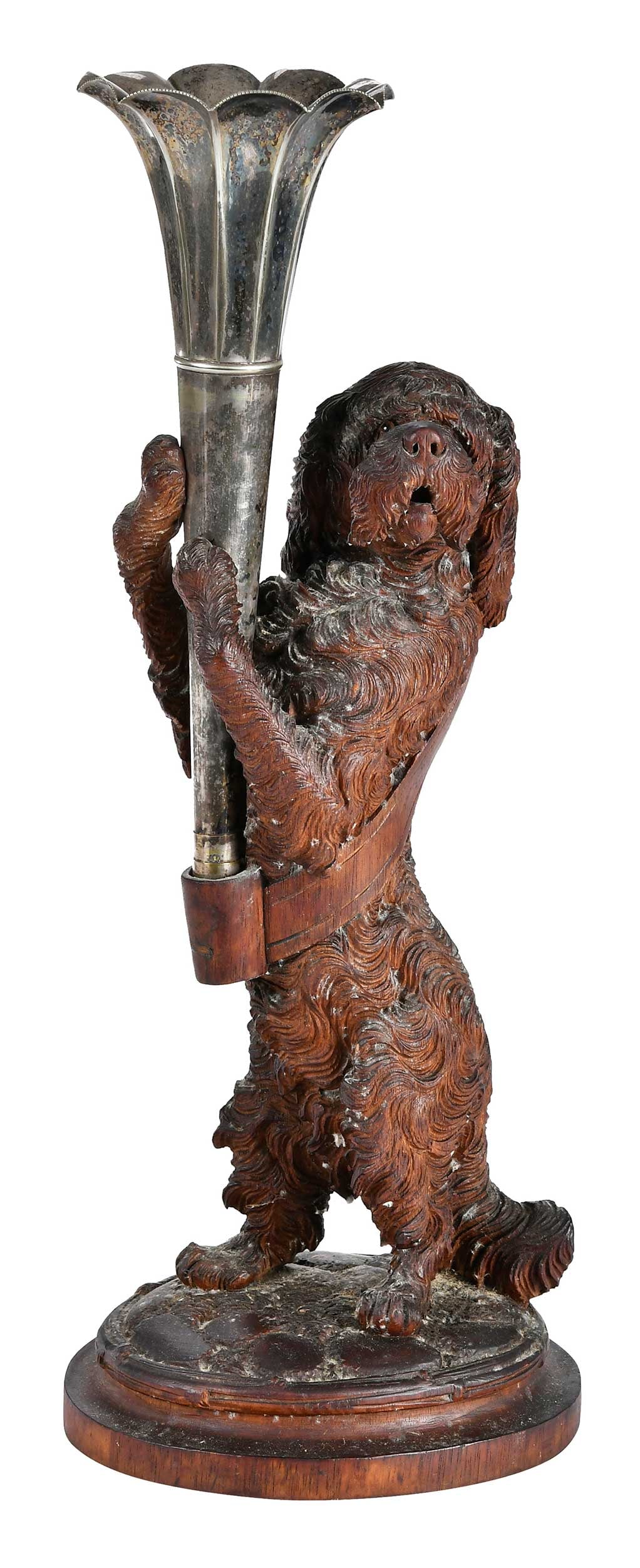 Black Forest Carved Wood and Silver Plate Dog Form Vase: German, late 19th/20th century, finely carved in the form of a spaniel supporting a removable silver plate trumpet vase, 18-1/2 x 7 x 6 in. Provenance: Collection of Steve Stewart, Lake Lure, North Ca