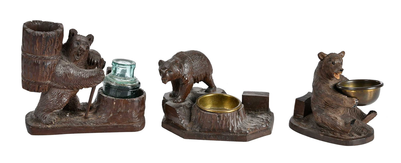 Three Black Forest Carved Bear Form Desk Objects: German, late 19th/20th century, largest 5-1/4 x 6 x 2-3/4 in. Provenance: Collection of Steve Stewart, Lake Lure, North Carolina