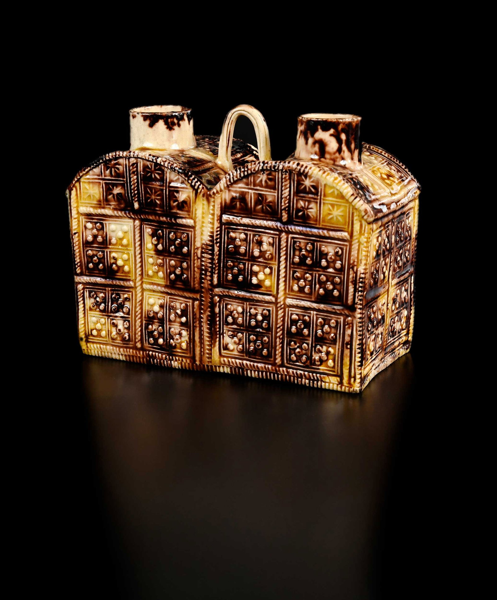 Rare Staffordshire Tortoiseshell Glazed Creamware Double Tea Caddy, Zeitlin Provenance: English, mid 18th century, molded rectangular form with arched tops, dot and star decoration, 4-1/4 x 5-1/4 x 2-1/2 in. Provenance: David and Charlotte Zeitlin Collection (sticker); Skinner, Victor an