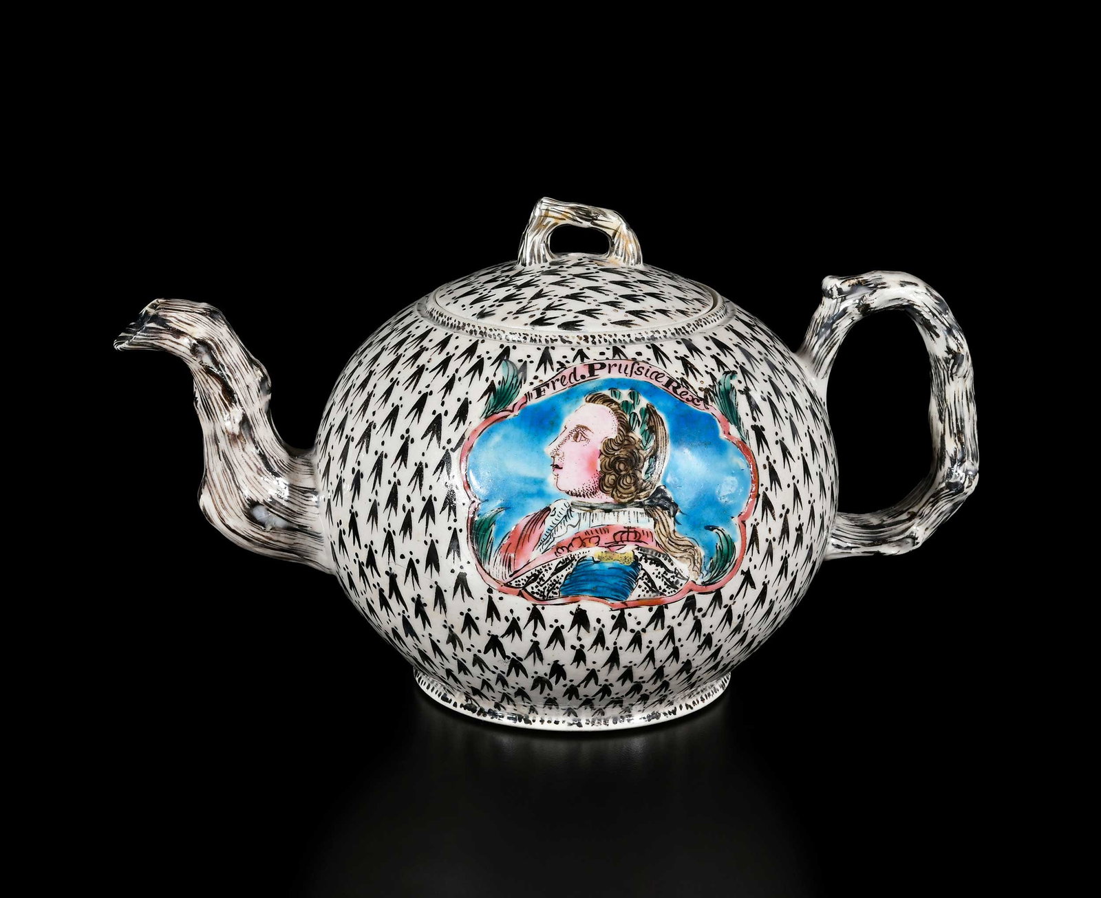 Staffordshire Frederick the Great of Prussia Salt Glazed Teapot, Horne Provenance: mid 18th century, approx. 5 x 8-3/8 x 5 in. Provenance: Jonathan Horne, London, March 2006 (accompanied by copy of receipt for $4,000); From the Collection of Elbert H. Parsons, Jr., Huntsville, Alaba