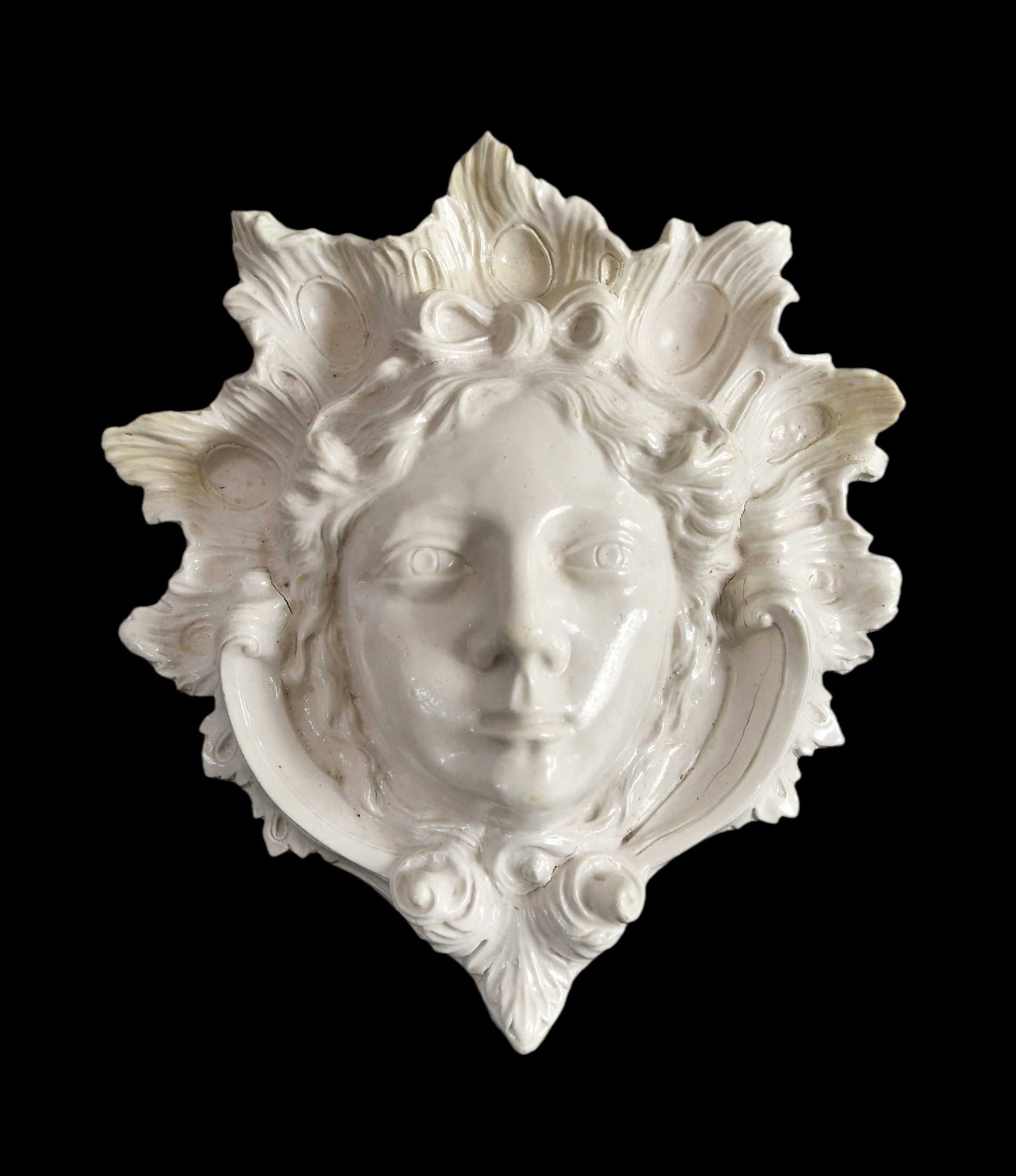 Staffordshire White Glazed Stoneware Mask Wall Pocket, Atkins Provenance: English, mid 18th century, finely molded in the form of a woman's face, 10 x 9 x 2 in. Provenance: Price Glover Collection (consignor notes); Garry Atkins, London, March 2023 (accompanied by copy of r