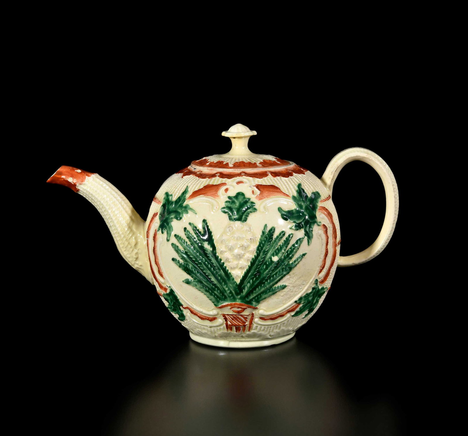 Staffordshire Polychrome Creamware Teapot with Pineapple Decoration, Horne Provenance: mid 18th century, Thomas Whieldon or style, molded decoration, 5-1/8 x 8-5/8 x 4-7/8 in. Provenance: Jonathan Horne Antiques, London, January 2006 (accompanied by copy of receipt for $6,800); From the