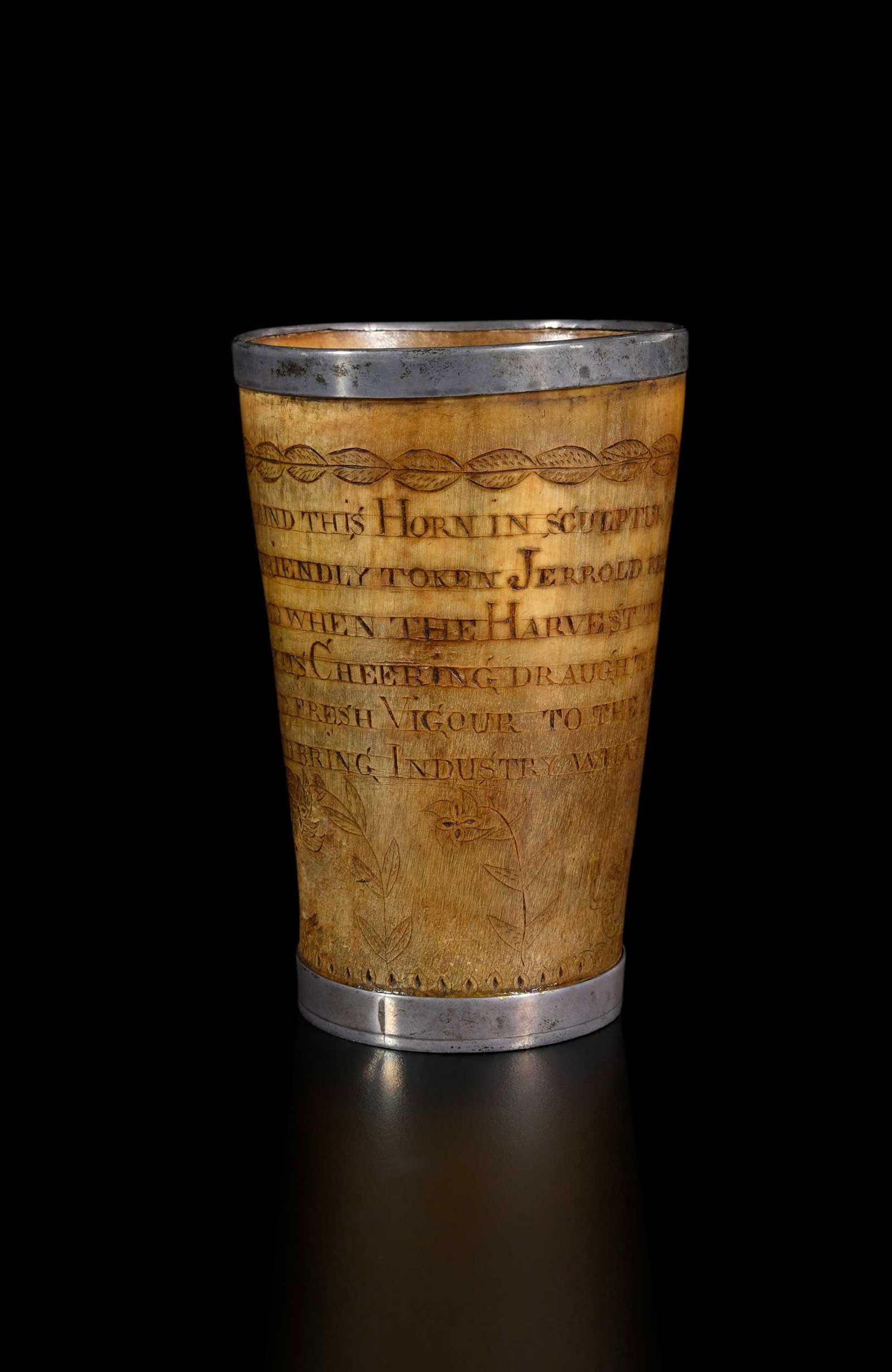 Unusual American Silver Mounted Mermaid and Fish Decorated Inscribed Horn Beaker: first half 19th century, probably sailor made for a farmer friend, incised decoration with ship, mermaid, fish, flowers, and leaf band to upper rim, poem reads "AROUND THIS HORN IN SCULPTUR'D LETTERS 