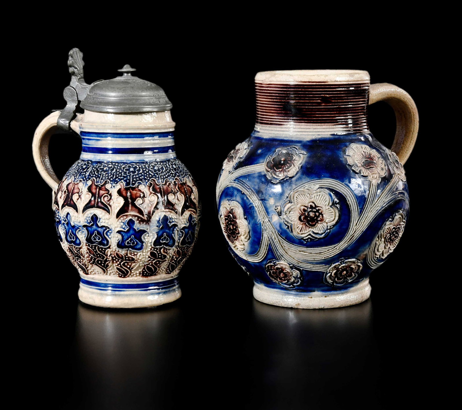 Two Small Westerwald Salt Glazed Stoneware Jugs, Brodrick Provenance: German, 18th century, each with floral sprig decoration, one with applied pewter handle and lid, larger 5 x 4-3/4 x 4 in. Provenance: Hollis E. Brodrick, Portsmouth, New Hampshire, February 2006 (acco