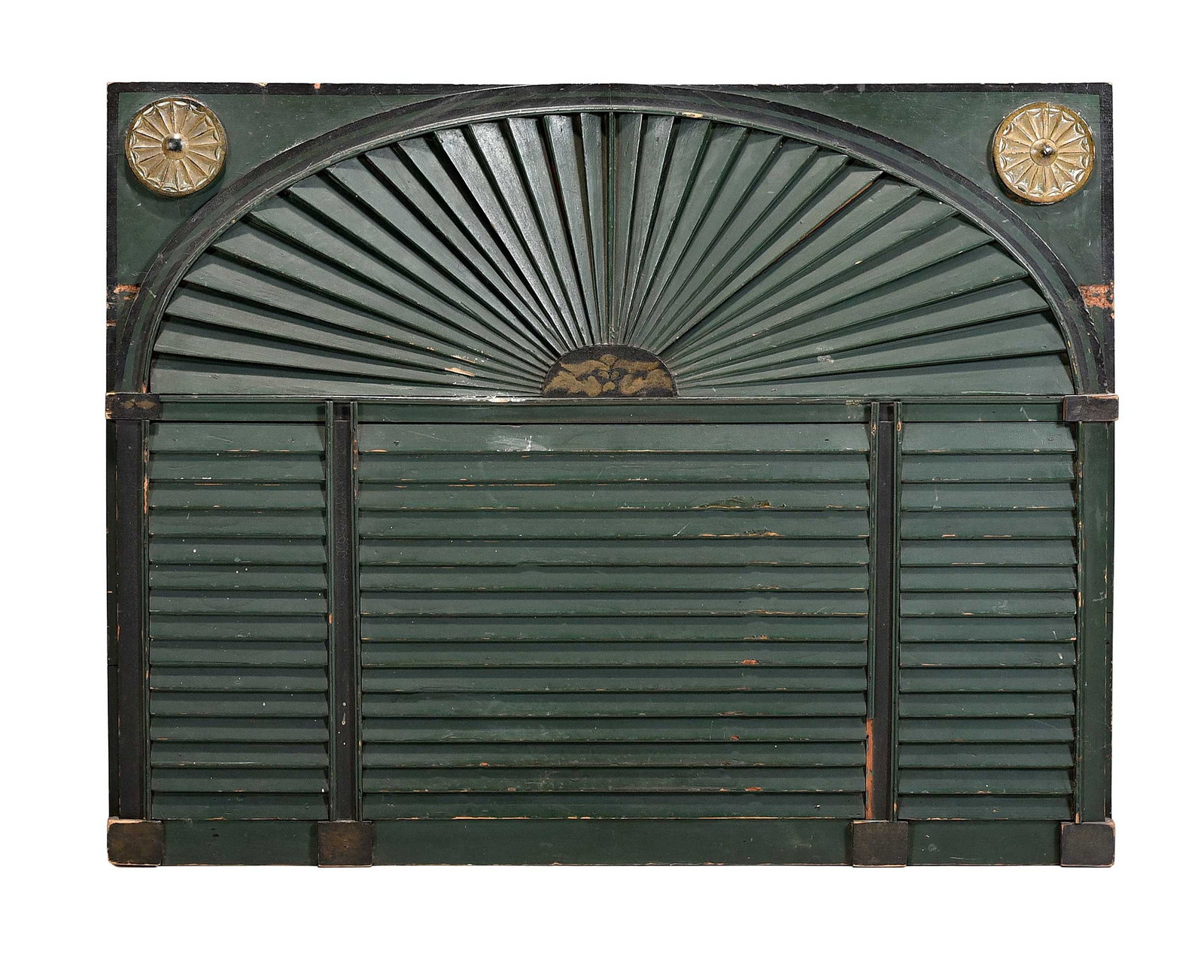 Unusual Federal Green Painted Louvered Chimney Board: probably Eastern Massachusetts, circa 1810, black and green painted and stenciled white pine, gilt medallions, 28-3/4 x 37 in. Provenance: Samuel Herrup, Sheffield, Massachusetts; a Private Collection