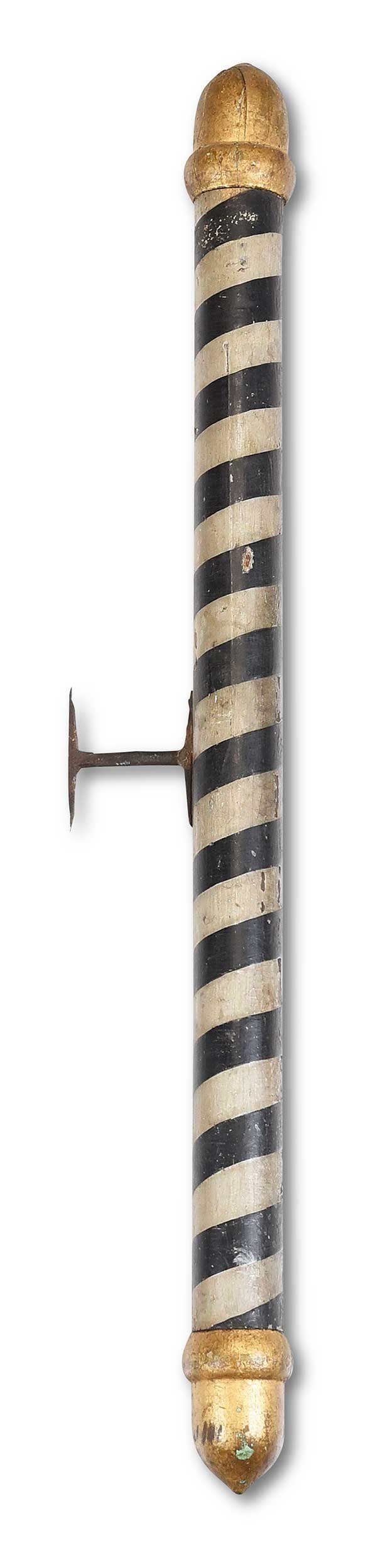 American Folk Art Carved Painted Barber/Mortician Pole: late 19th century, iron hanger, 45 x 3-1/2 x 7-1/4 in. Provenance: Gemini Antiques, New York, NY, April 1997 (accompanied by a copy of receipt for $1,250); From the Collection of Elbert H. Parsons, Jr