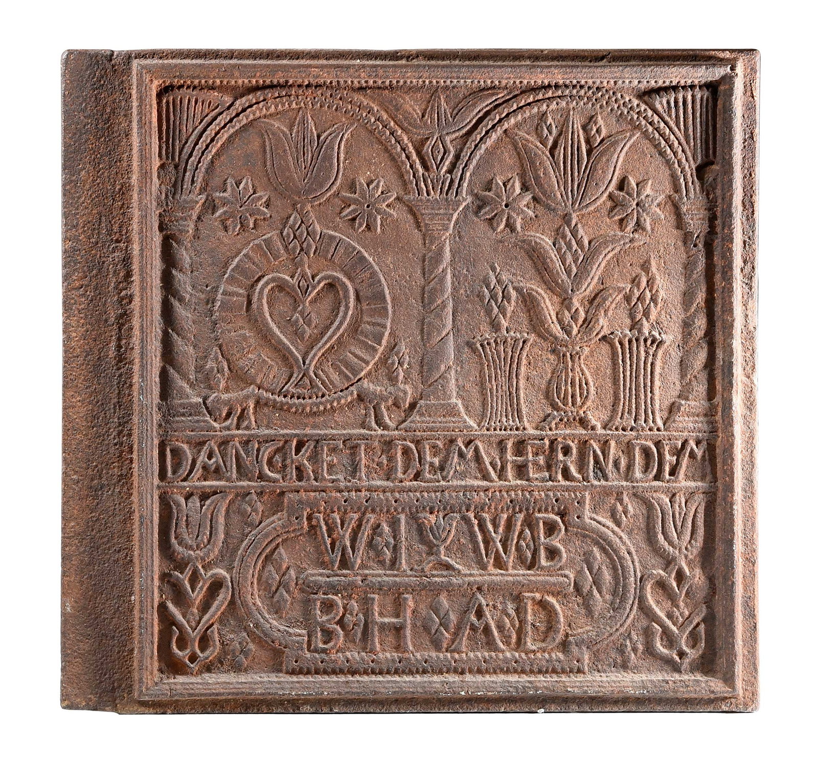 Early and Fine Pennsylvania Cast Iron Stove Plate, Mary Ann Furnace: York County, Pennsylvania, mid 18th century, decorated with hearts and tulips, text reads "DANCKET DEM HERN DEM / WI WB / BH AD", 22-1/4 x 23-1/4 x 3-4 in. Provenance: Anne S. McPherson, Nashville, Te