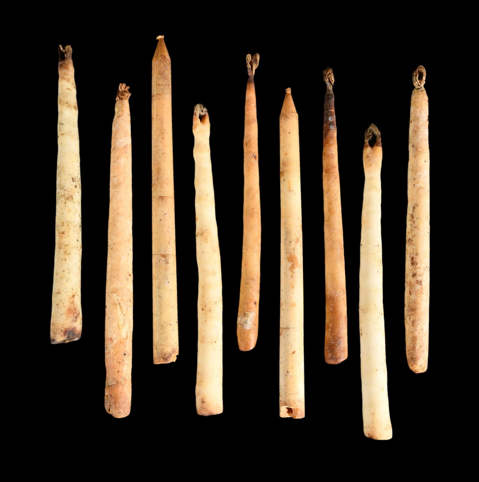 Nine 18th Century Tallow Candles, Brodrick Provenance: probably American, each of tapered form, largest 10 x 1/2 x 1/2 in. Provenance: Hollis E. Brodrick, Portsmouth, New Hampshire, December 2012 (accompanied by receipt for a group of seven for $700); Fro