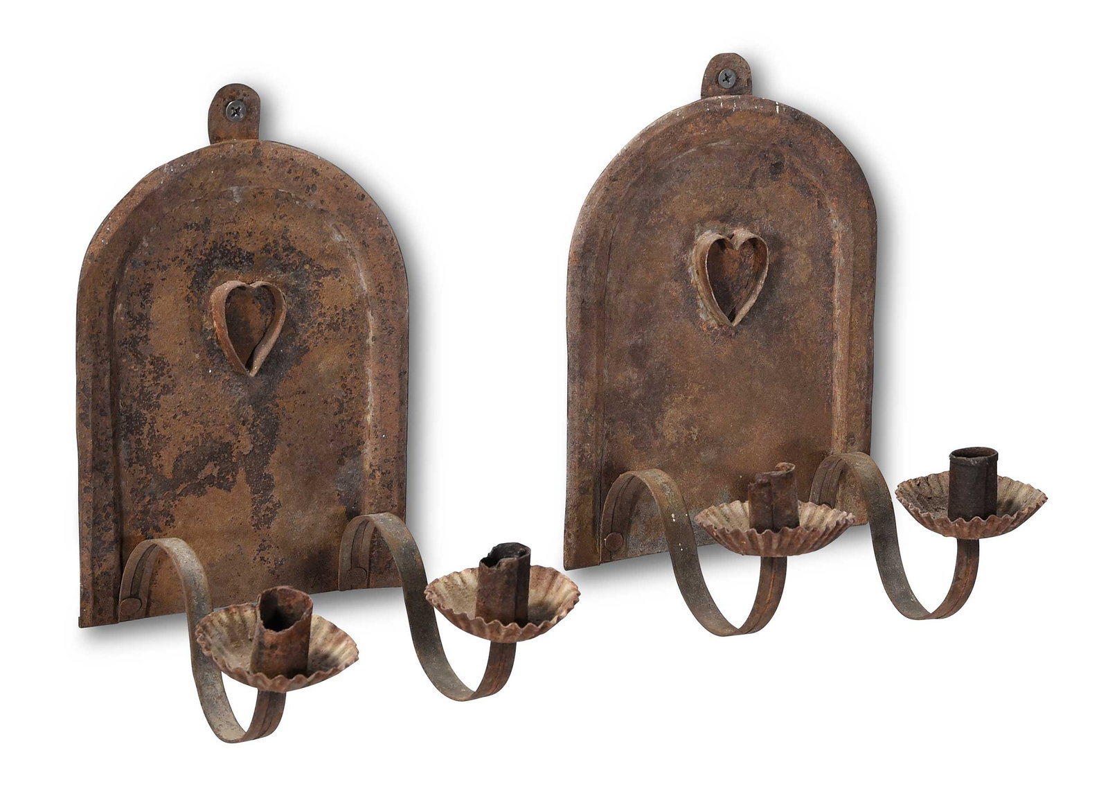 Pair of Heart Decorated Two Light Wrought Sheet Metal Sconces, Kindig Provenance: American, probably circa 1820, arched backplates and crimped wax pans, 8-1/2 x 5-3/4 x 6-1/2 in. Provenance: Joe Kindig Antiques, York, Pennsylvania, November 2017 (accompanied by copy of receipt for 