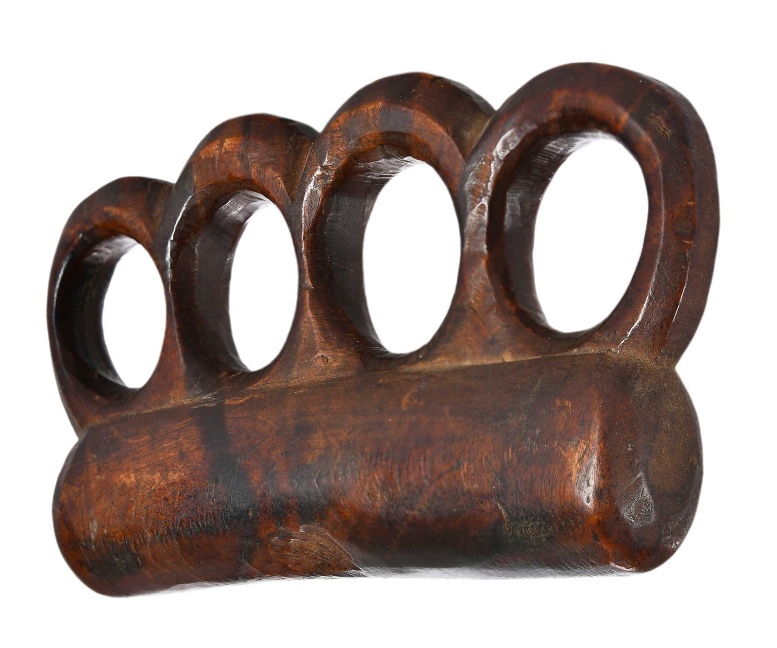 Rare and Published American Carved Maple Burl Knuckles: New England, first half 19th century, well carved from a single block of burl, holes carved to accommodate respective finger sizes, 2-1/2 x 4-1/2 x 3/4 in. Provenance: Don Olson Fine American Antiques