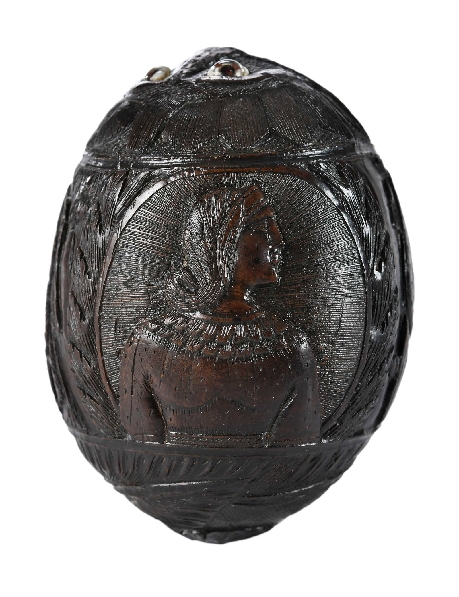 19th Century Carved Coconut "Bugbear" Flask: French, intricately carved with portraits of an admiral, and a woman (possibly a Native American), and cupid with bow, whimsical face mask opening with later inset glass eyes, 4-1/4 x 3 x 3 in. Proven