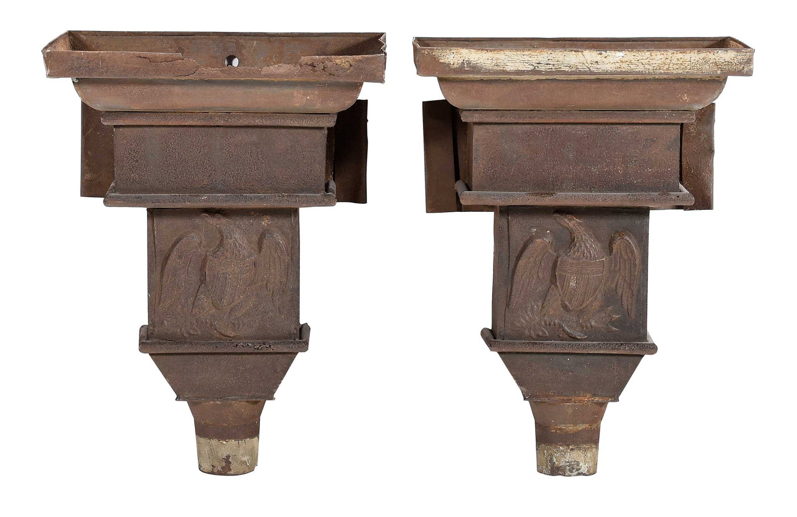 Pair of Rare Eagle Decorated Architectural Downspout Heads, Guthman Provenance: American, mid 19th century, sheet metal construction, traces of paint decoration including extremely faint date "1853" over Great Seal in relief, 19 x 14 x 8-1/4 in. Provenance: Guthman Americana, Wes