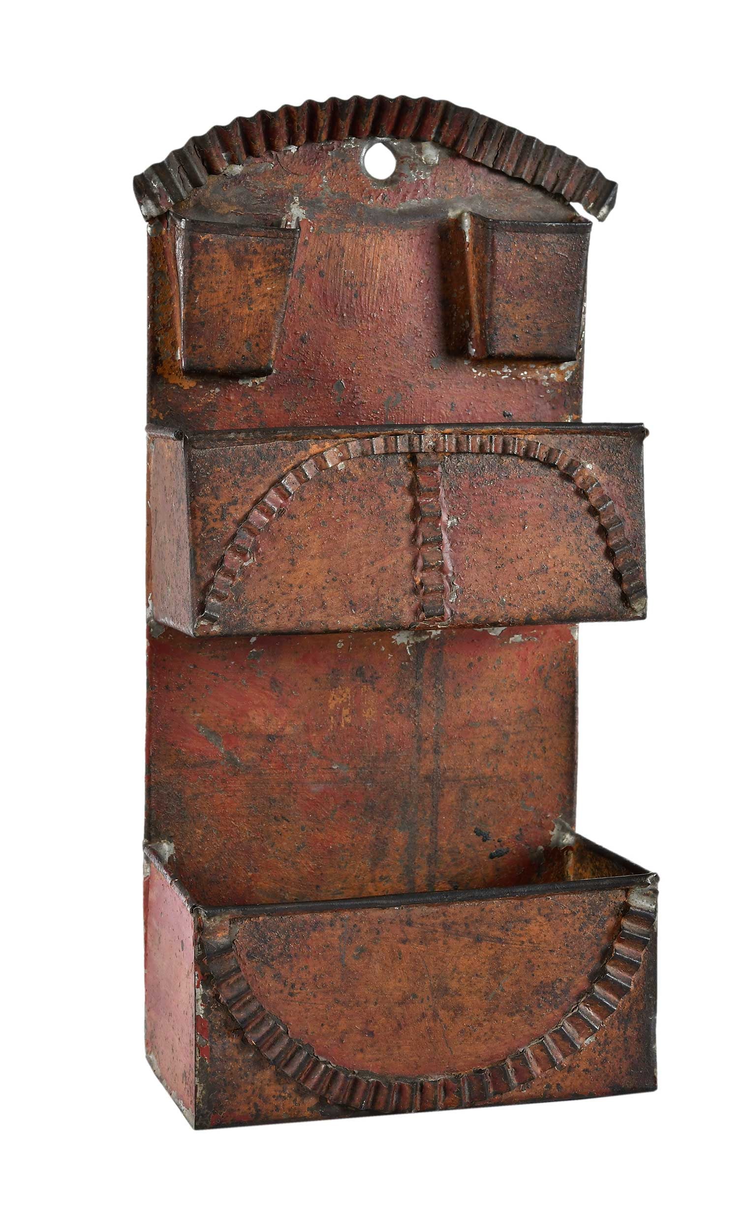 Folk Art Decorated Tole Pipe Rack/Candle Box in Original Red Paint: probably American, 19th century, old red painted surface, single hole for hanging, 13-3/4 x 6-1/2 x 3-3/4 in. Provenance: According to consignor notes, acquired from Jeffrey Evans; From the Collection