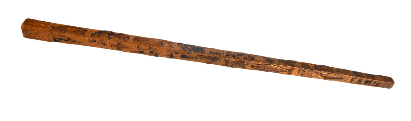 Decatur, Alabama Folk Art Carved Cane, Wheatcroft Provenance: signed and dated "10.1.30 / E. N. Wear. / Decatur / Ala" in carved lettering along sides, whimsical carvings depicting various animals, 33 x 1-1/4 x 1-1/4 in. Provenance: David Wheatcroft Antiques,