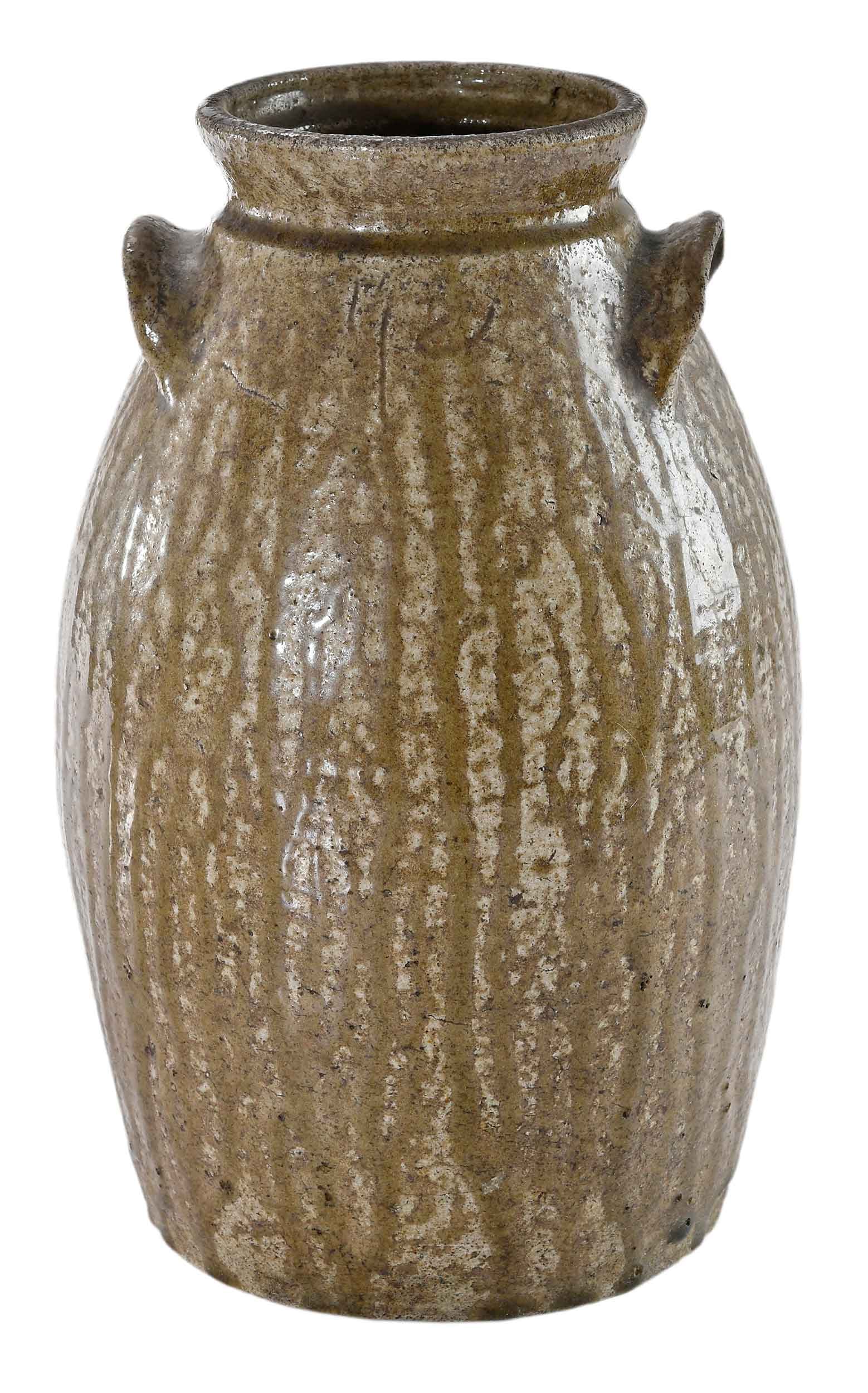 Alabama Attributed Small Form Stoneware Churn: possibly attributed to the Boggs family of Makers, Randolph County, Alabama, circa late 1800s, runny olive green ash glaze over cream field, tapered ovoid form, indiscernible inscribed letters or