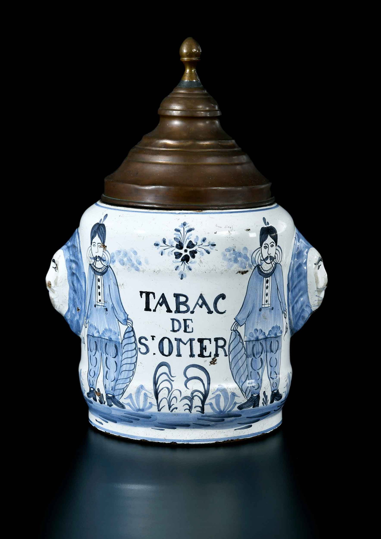 Dutch Delft Blue and White Lidded Tobacco Jar with Lion Mask Handles: 18th century, brass lid, previous owner's initials marked to underside, approx. 12-1/2 x 9-1/2 x 7 in. Provenance: Claystrong Enterprises, Chambersburg, Pennsylvania, Auction Sale 22, John (JD)