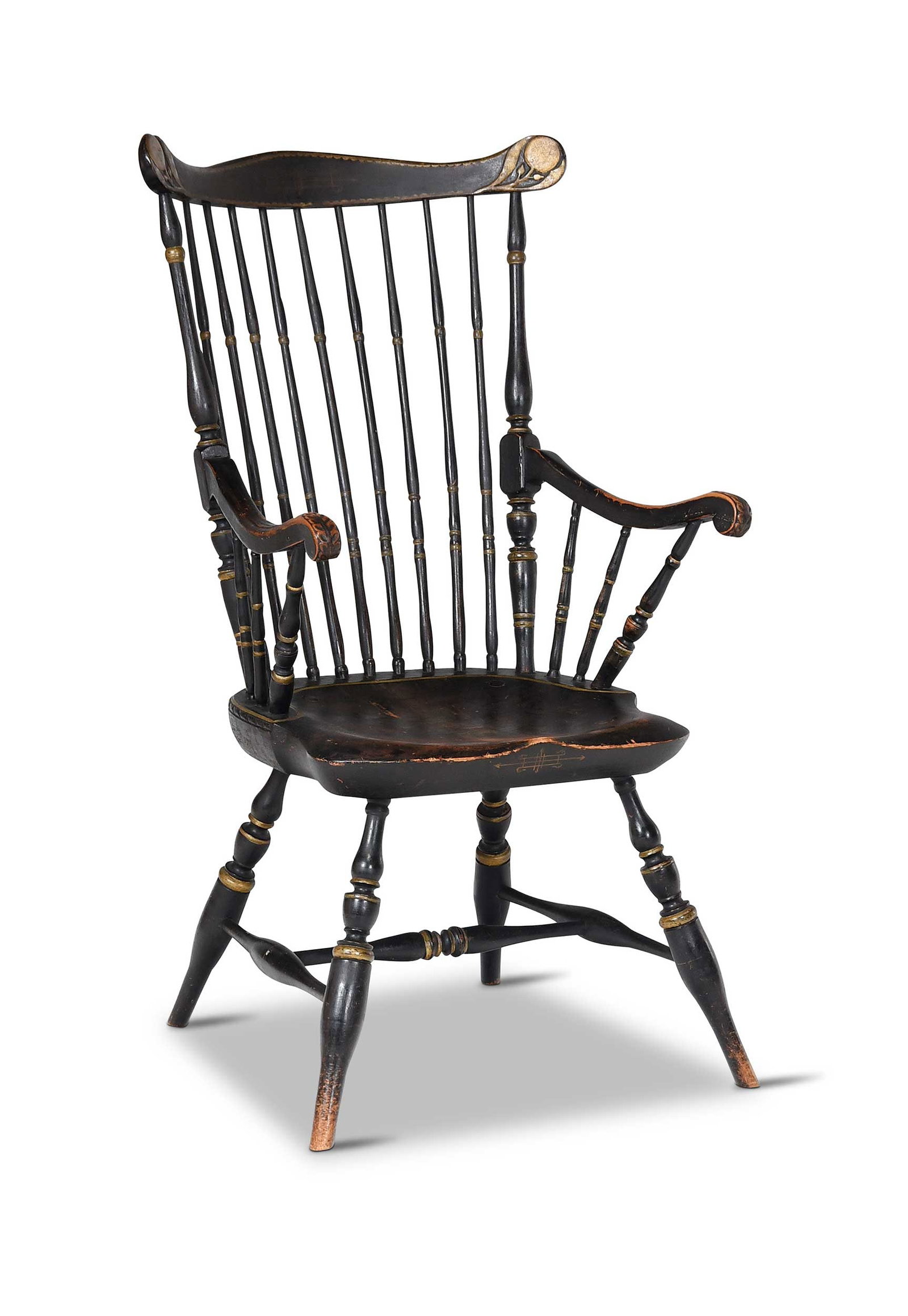 Rare New England Paint Decorated Comb Back Windsor Armchair: Connecticut, Rhode Island, or possibly Nantucket, late 18th/early 19th century, scrolled arms carved with acanthus leaves, curved crest rail ears carved with fruit and leaf, unusual rope twist carved 