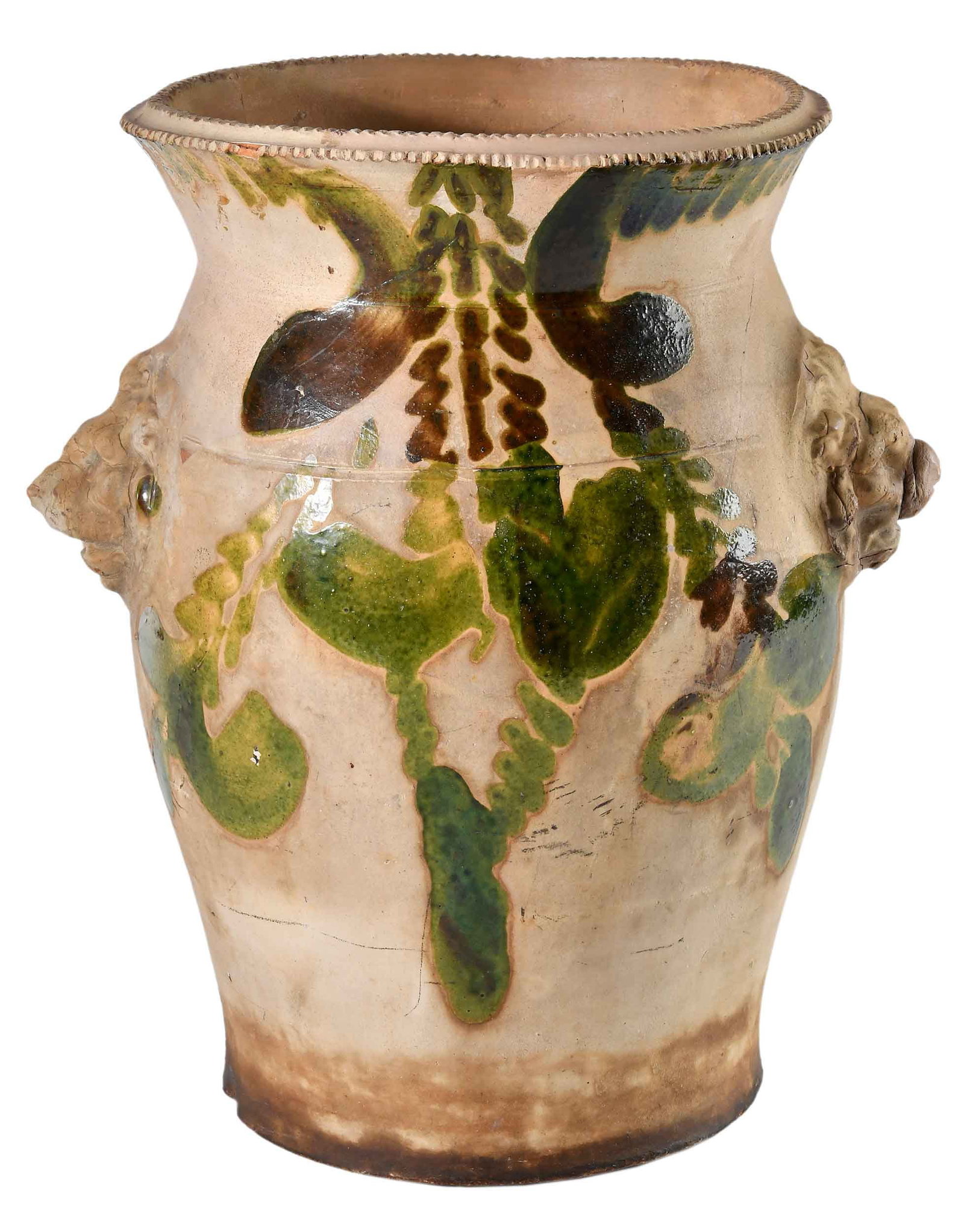 Solomon Bell Strasburg, Virginia Attributed Earthenware Jardiniere with Lion Head Handles: mid to late 19th century, apparently unmarked, manganese, copper, and engobe glaze, decorative coggled rim, 15-1/4 x 12-1/2 x 10-1/2 in. Provenance: Collection of Dr. George and Connie Manger Literatu