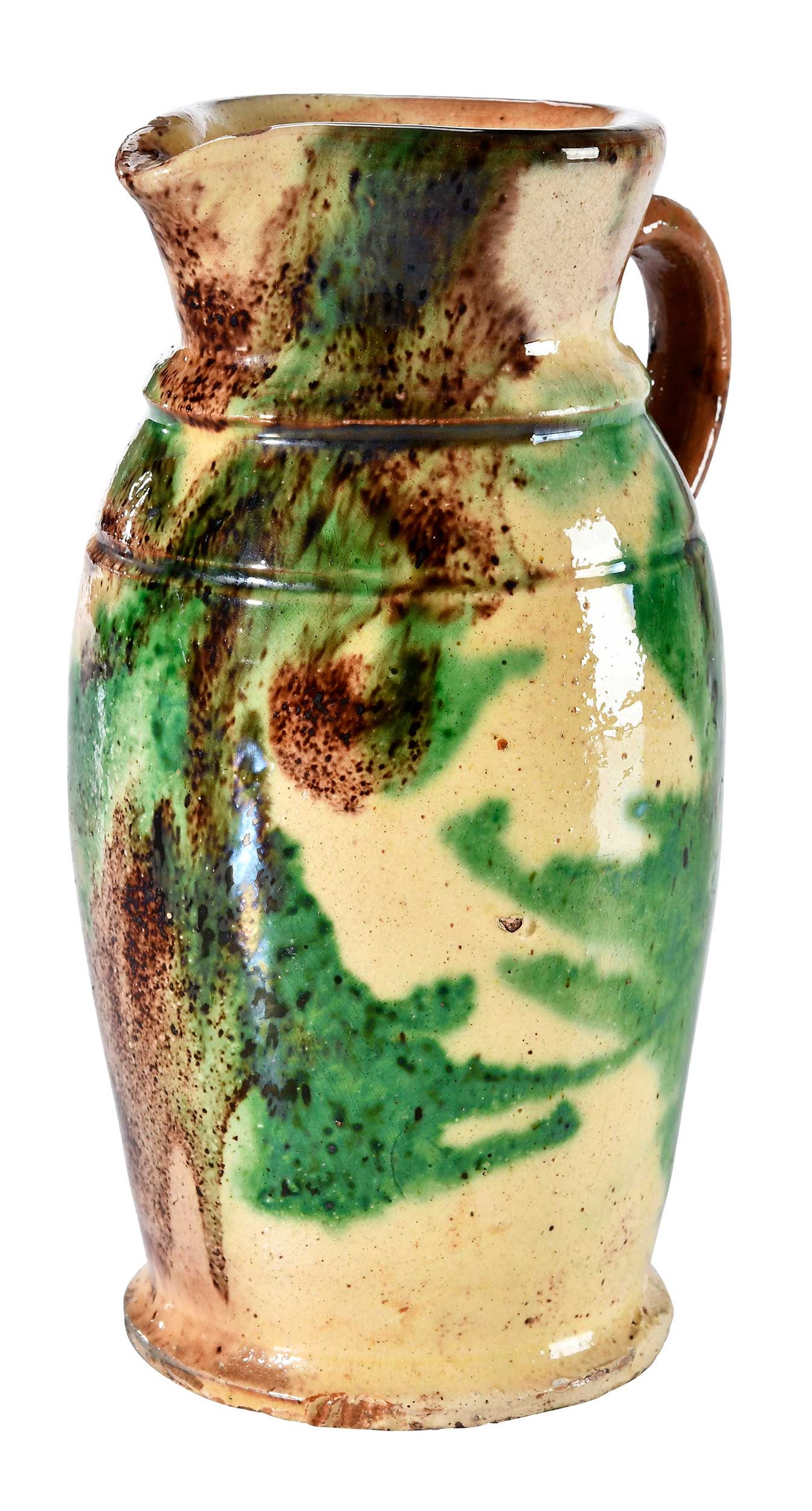 Fine J. Eberly & Co. Strasburg, Virginia Attributed Lead Glazed Earthenware Creamer: Shenandoah Valley, circa 1885-1899, multicolor copper and manganese slip, lead oxide and engobe glaze, tapered body, footed base, rounded shoulder, incised band at shoulder through small applied strap